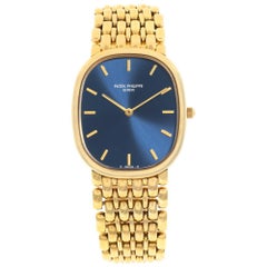 Montre automatique Patek Philippe Ellipse 3738/122 en or jaune avec cadran bleu 34 mm