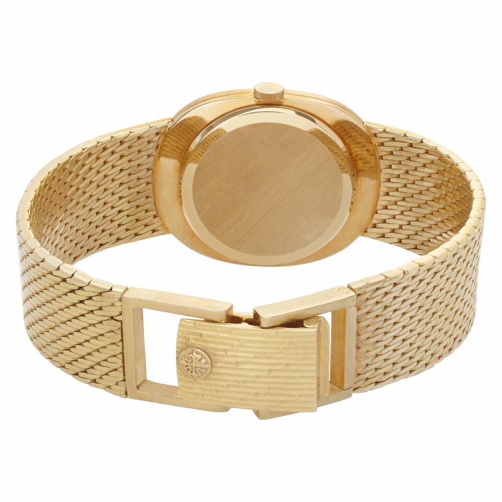 Patek Philippe Ellipse Reference #:3748/1. Patek Philippe Ellipse in 18k yellow gold with mesh bracelet. Manual wind movement. With Archive papers. Case size: 27 mm x 32 mm. Ref 3748/1. Circa 1977. Fine Pre-owned Patek Philippe Watch. Certified