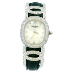 Patek Philippe Ellipse 4832 Montre pour femme en or blanc 18 carats avec cadran MOP pavé