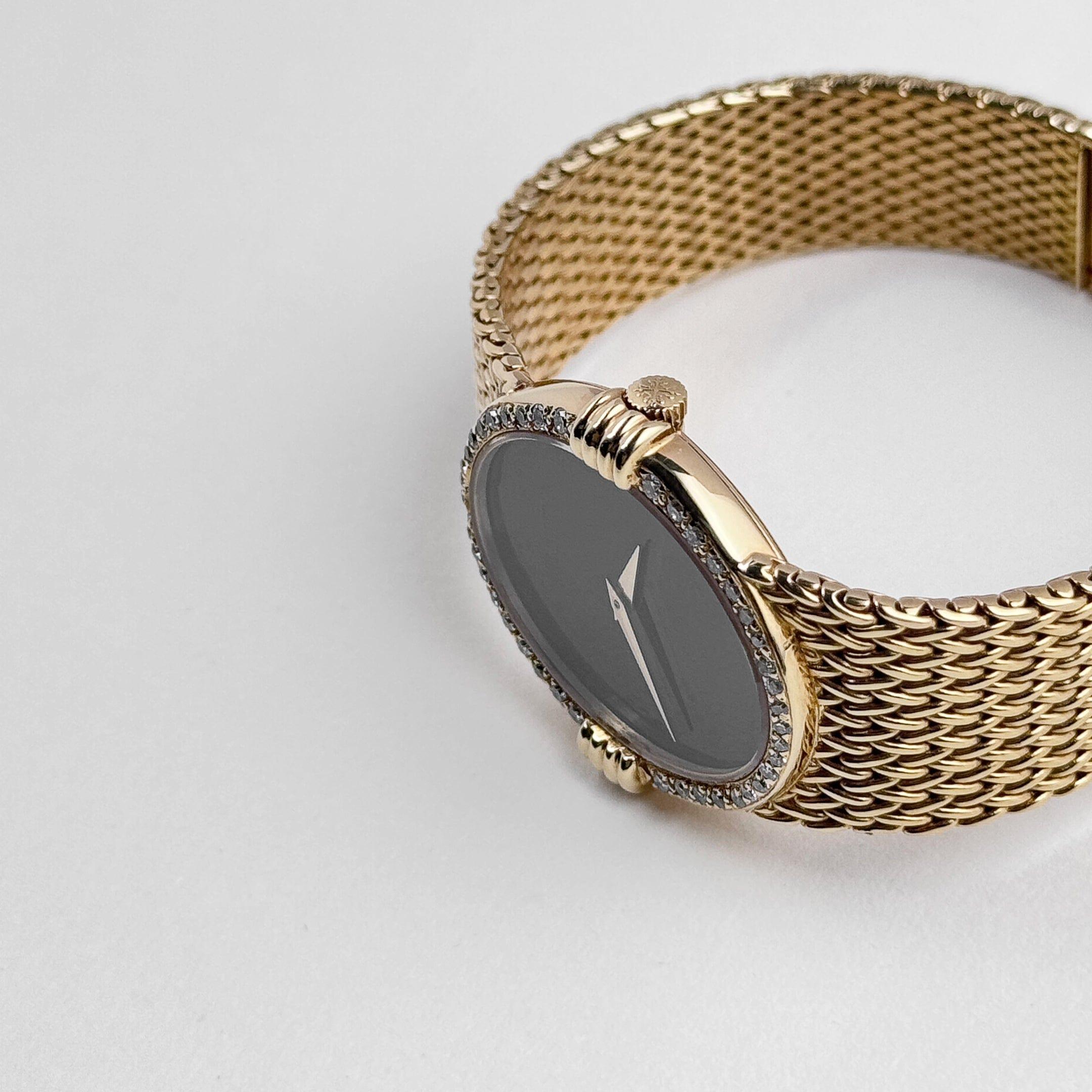 Patek Philippe Ellipse Vintage Yellow Gold Black Onyx Dial Diamond Bezel In Good Condition For Sale In New York, NY