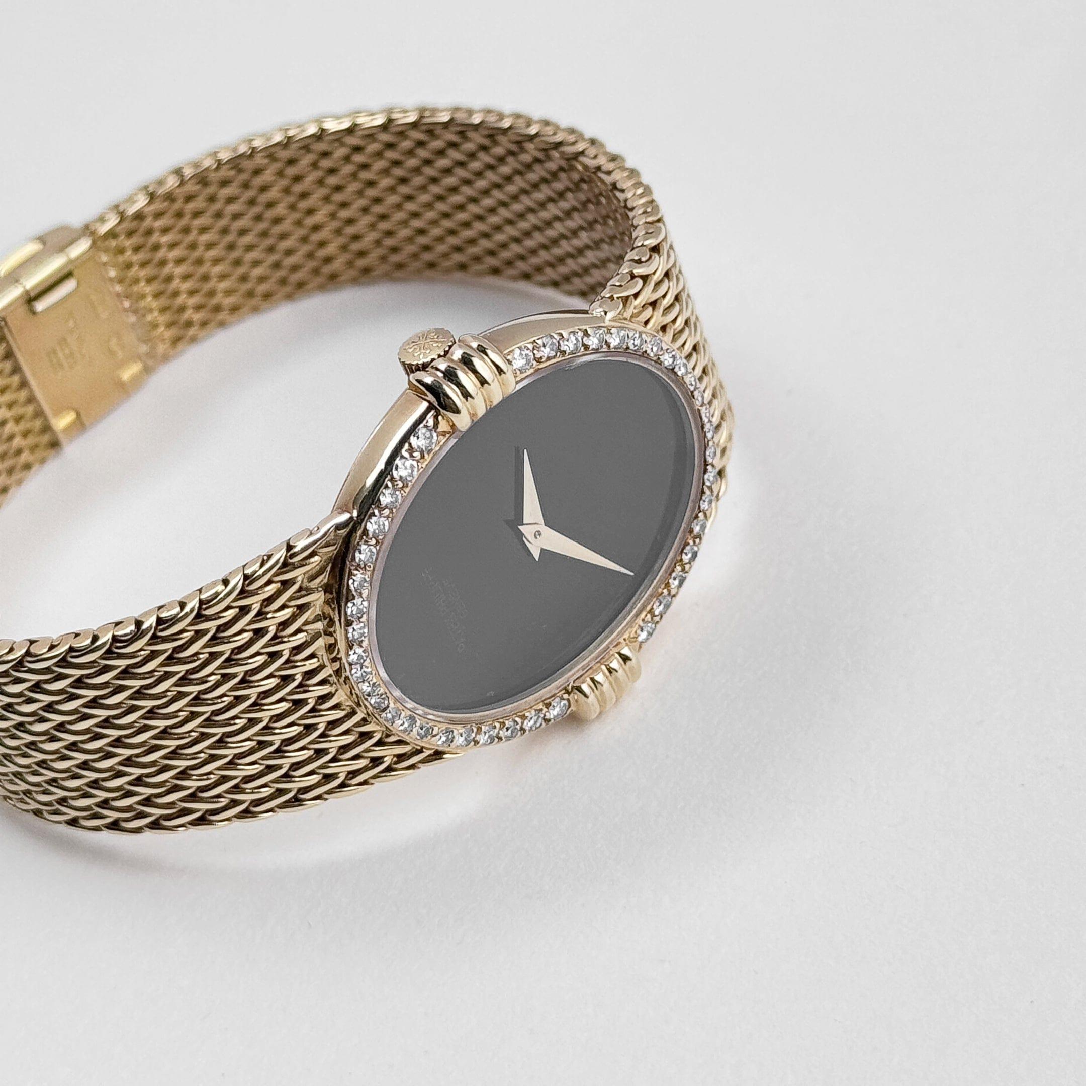 Women's Patek Philippe Ellipse Vintage Yellow Gold Black Onyx Dial Diamond Bezel For Sale