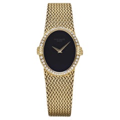 Patek Philippe Ellipse Vintage Or Jaune Cadran Onyx Noir Lunette Diamant