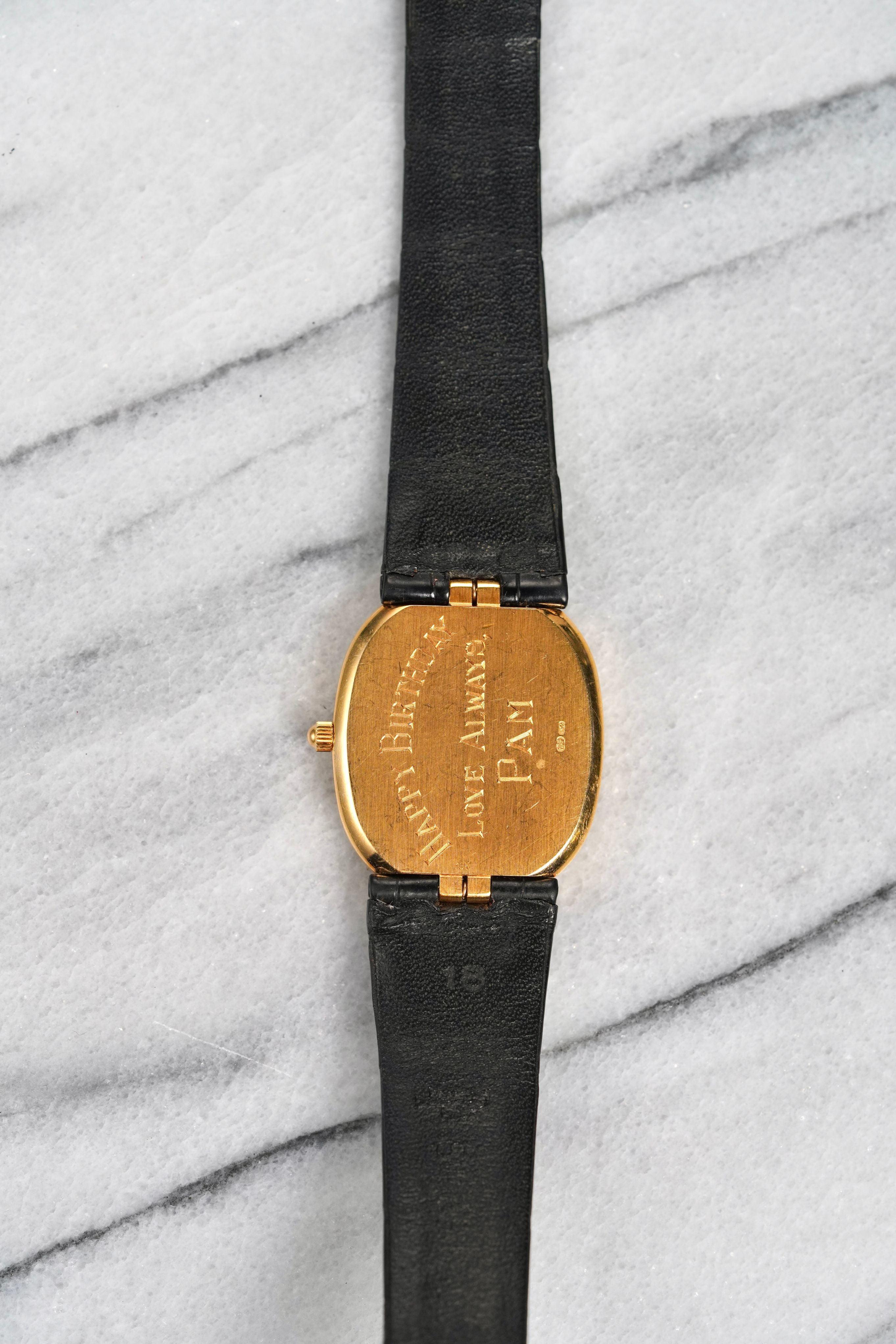 Here’s a Patek Philippe Ellipse reference 3788 in quartz featuring a blue dial from the 1970s. Measurments include a 28x33mm case size. 18K yellow gold case and buckle. On its original black leather strap and buckle. Quickset date function at 3 a