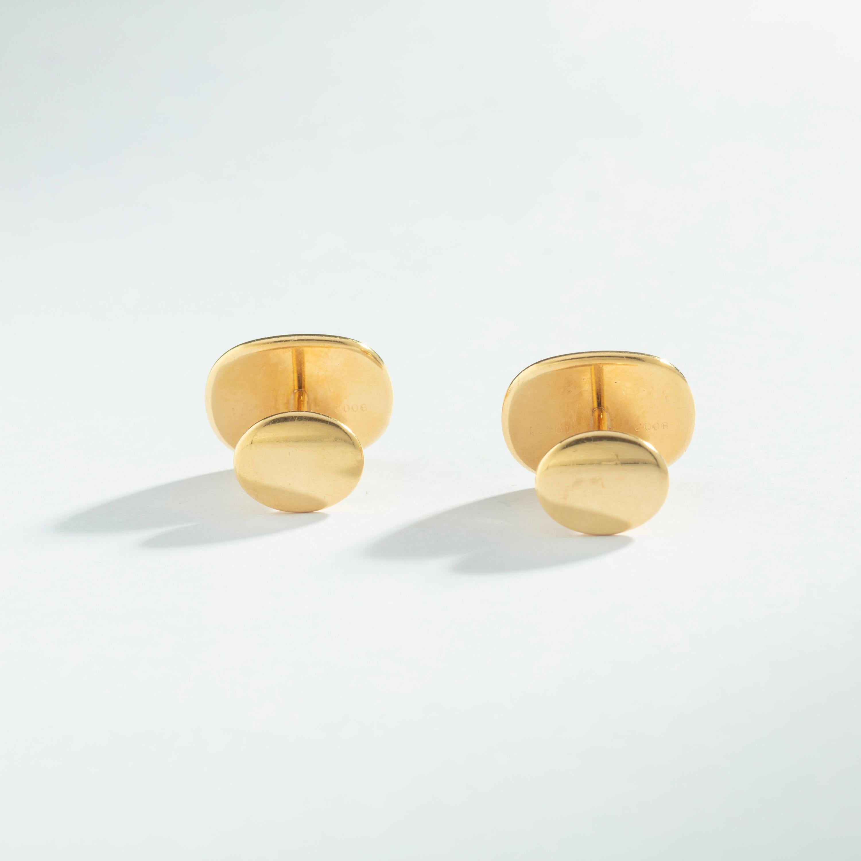 Patek Philippe Ellipse Yellow Gold 18k Cufflinks 1970S.
Largest size. 

Handsome 18K yellow gold cufflinks from the Ellipse collection by Patek Philippe. These are the largest size available and feature a sharp blue sunburst face. Refined and