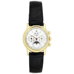 Patek Philippe Montre chronographe à calendrier perpétuel en or jaune fin avec phases de la lune