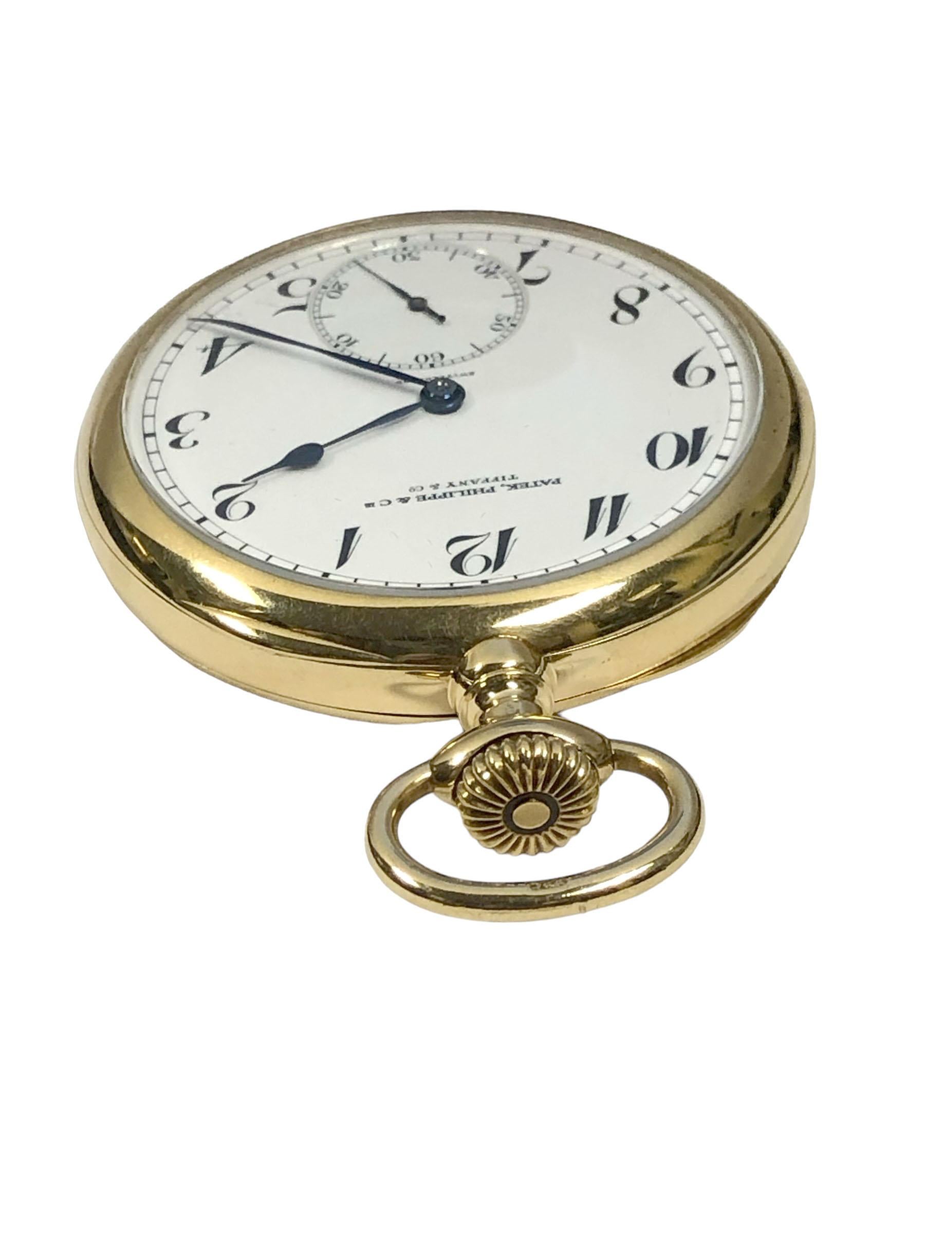 Circa 1920 - 1925 Patek Philippe for Tiffany & Company very fine and high Grade Pocket Watch, 50 M.M 18k Yellow Gold 4 Piece case including inside dust cover (Cuvette) 23 Jewel Mechanical Nickle Lever movement. Porcelain single sunk dial. An