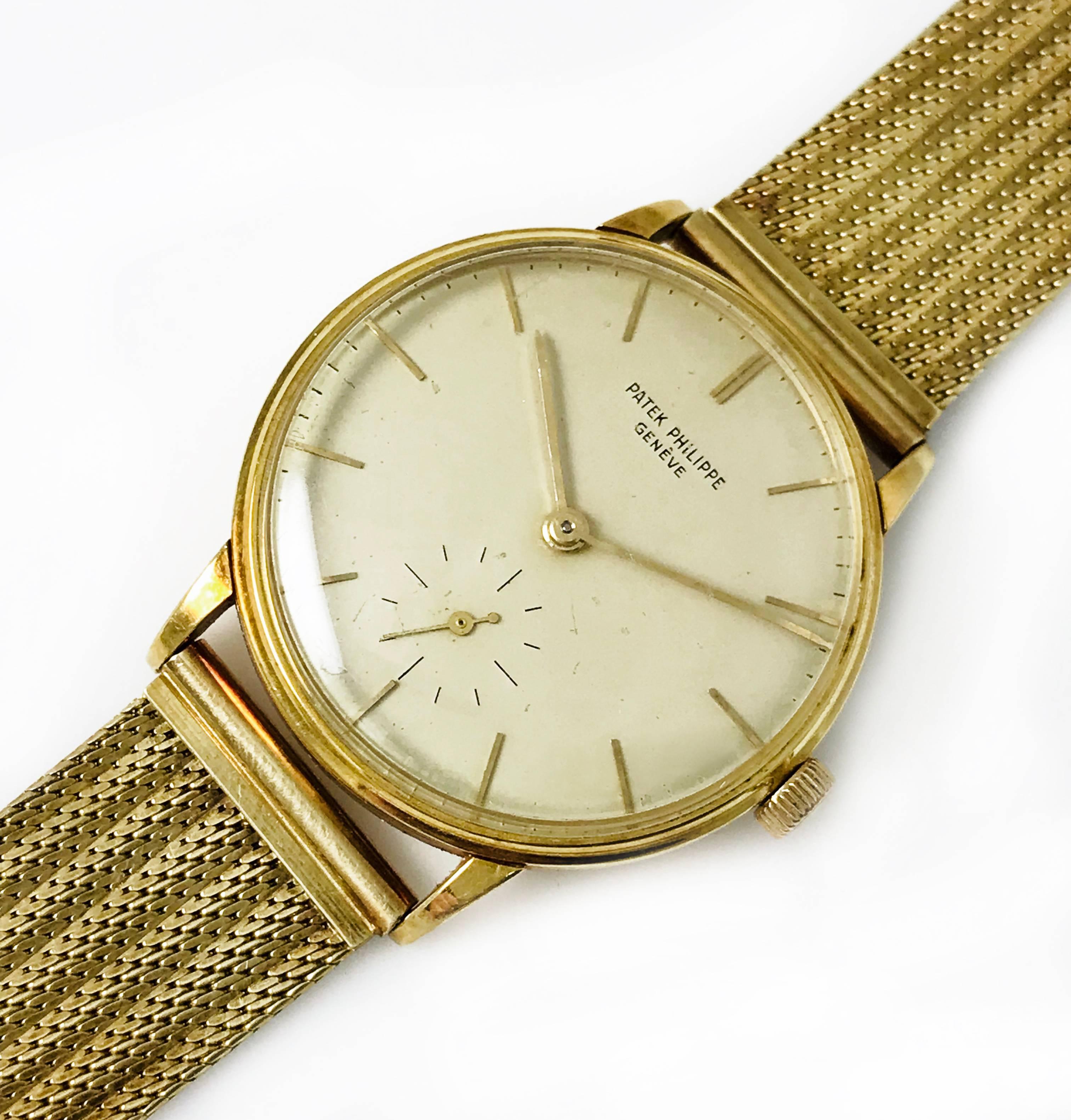 Patek Philippe & Co. Genéve 18k Gold case, 18 Jewels Watch. Gold baton-style hour and minute hands for dial and sub-dial, slight curve on the lugs, manual wind movement. Inscribed on the inside of the back of the timepiece is Serial #7318835