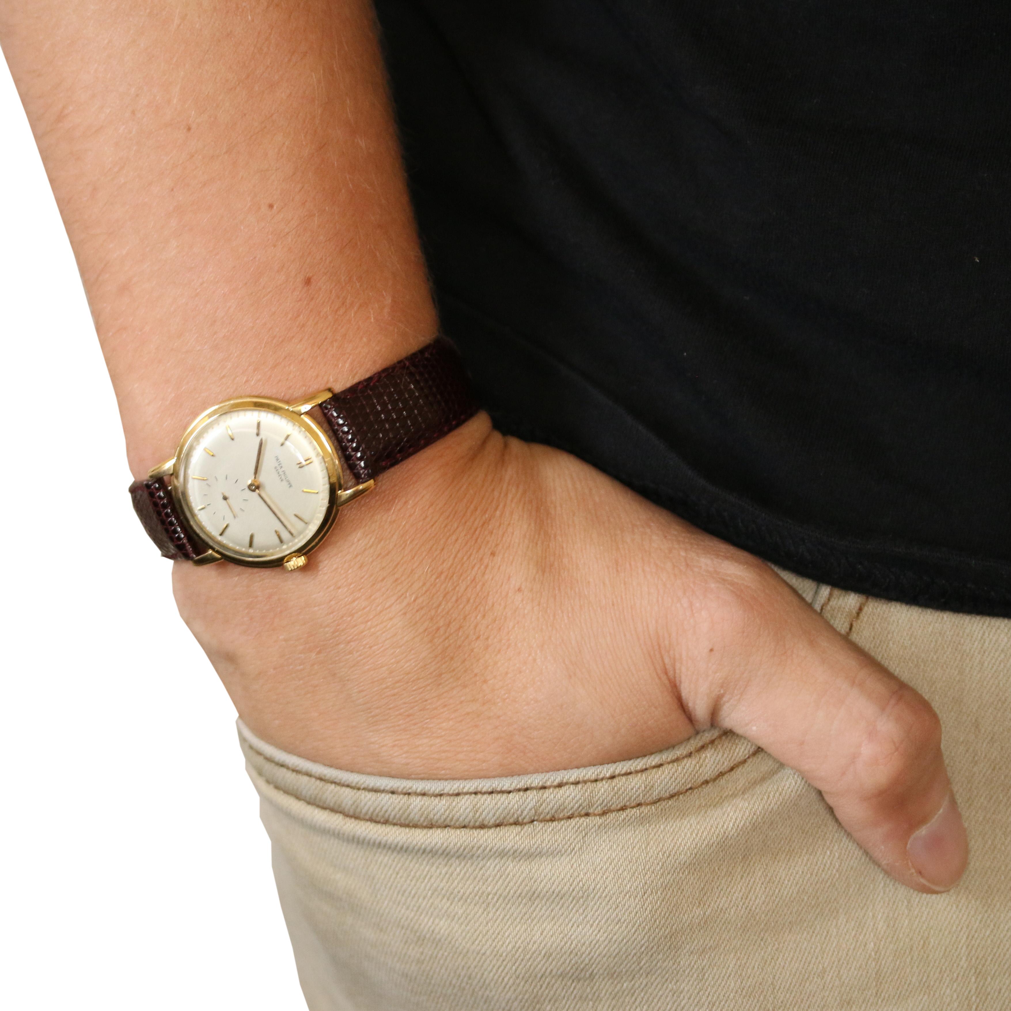 This is an authentic Patek Philippe wristwatch. The watch has been professionally serviced and comes with a two-year warranty along with a generic black presentation box.

Brand: Patek Philippe Geneve
Materials: 18k Yellow Gold (case) & Genuine