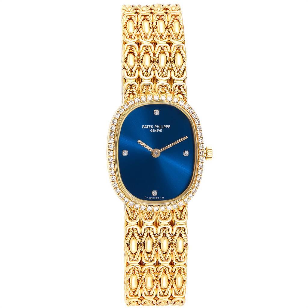 Patek Philippe Golden Ellipse 18k Yellow Gold Blue Dial Ladies Watch 4698. Quartz movement. 18k yellow gold cushion shaped case 22.0 mm x 24.0 mm. Scratch resistant sapphire crystal. Blue sunburst dial with diamond quarters hour markers and twisted