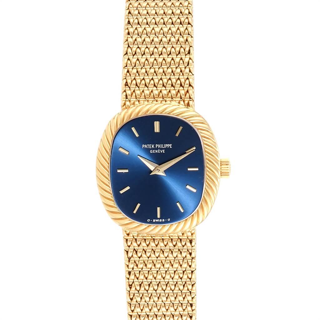 Patek Philippe Golden Ellipse 18k Yellow Gold Blue Dial Mens Watch 4461. Manual winding movement. 18k yellow gold cushion shaped case 22.0 mm x 21.0 mm. Scratch resistant sapphire crystal. Blue sunburst dial with raised gold buton hour markers and