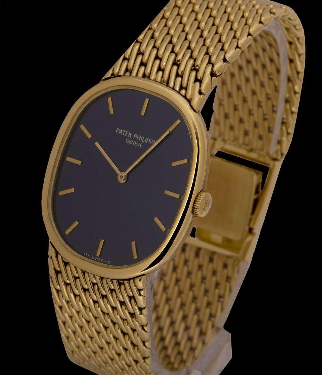An 18k Yellow Gold Golden Ellipse Gents Wristwatch, blue dial with applied hour markers, a fixed 18k yellow gold bezel, an 18k yellow gold bracelet with an 18k yellow gold jewellery style clasp, sapphire glass, manual wind movement, in excellent