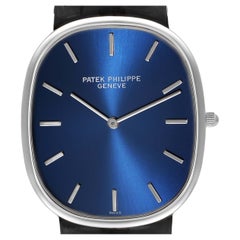 Vintage Patek Philippe Golden Ellipse Grande Taille Platinum Blue Dial Watch 5738