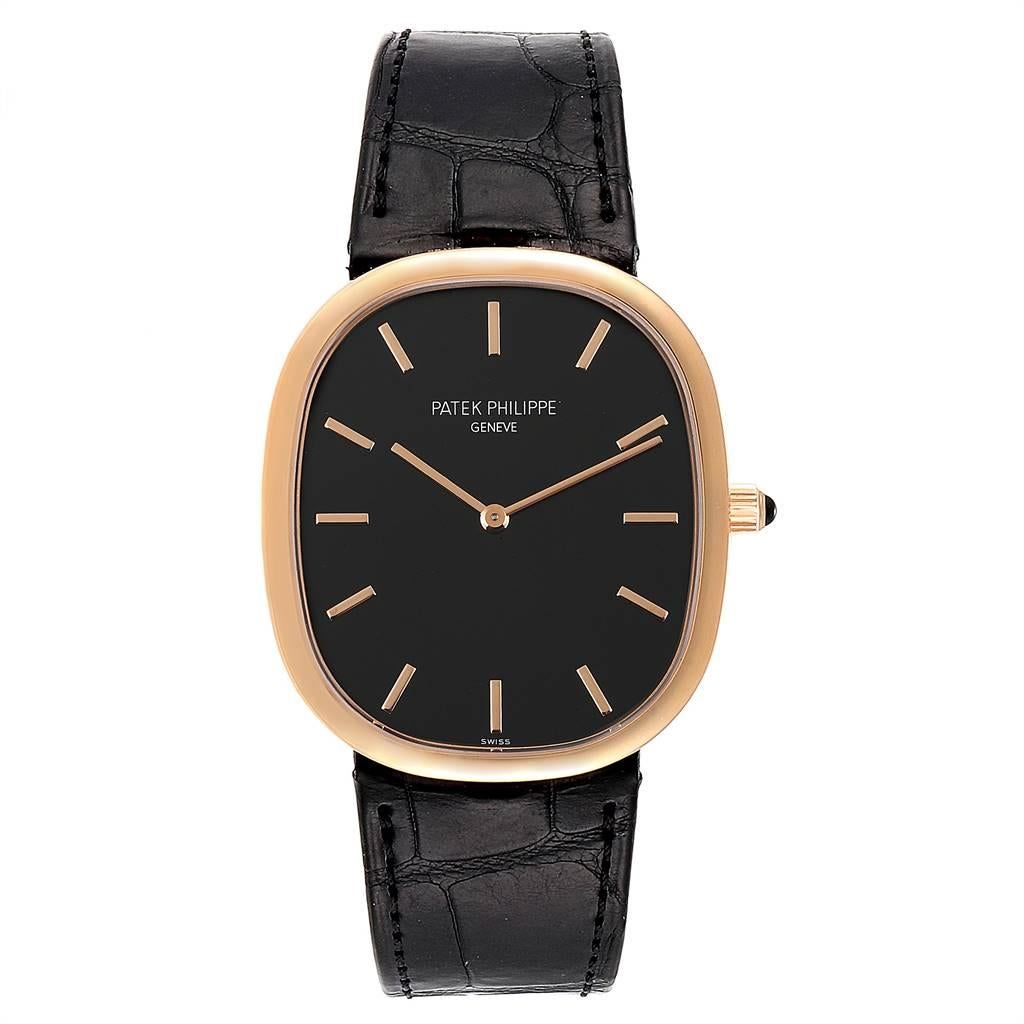 Patek Philippe Golden Ellipse Grande Taille Rose Gold Black Dial Watch 5738. Automatic self-winding lever movement.   . 18k rose gold ultra-thin case 34.5 x 39.5 mm. T-bar lugs. Crown set with an onyx. Scratch resistant sapphire crystal. Ebony black