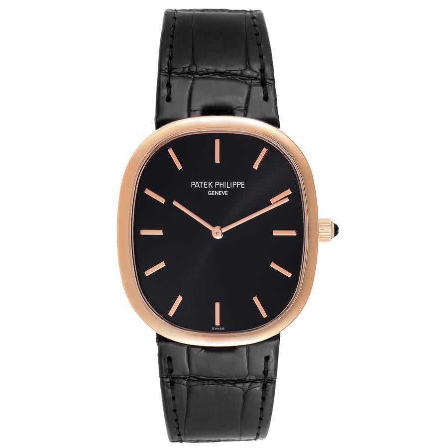Patek Philippe Golden Ellipse Grande Taille Rose Gold Watch 5738 Box Papers. Automatic self-winding lever movement. 18k rose gold ultra-thin case 34.5 x 39.5 mm. T-bar lugs. Crown set with an onyx. . Scratch resistant sapphire crystal. Ebony black