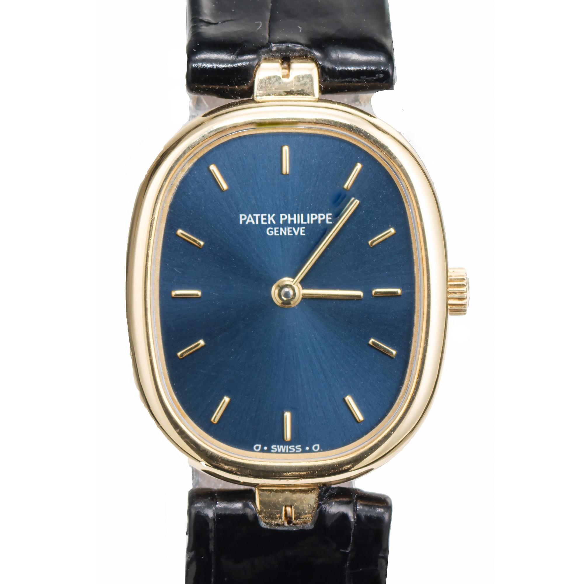 Patek Philippe Ladies golden ellipse 18k yellow gold wristwatch. Ref 4764 Quartz movement. Blue dial with 18k yellow gold markers. New black leather Patek leather band with an 18k Patek buckle.
 
Length: 29.37mm
Width: 19.80mm
Band width at case: