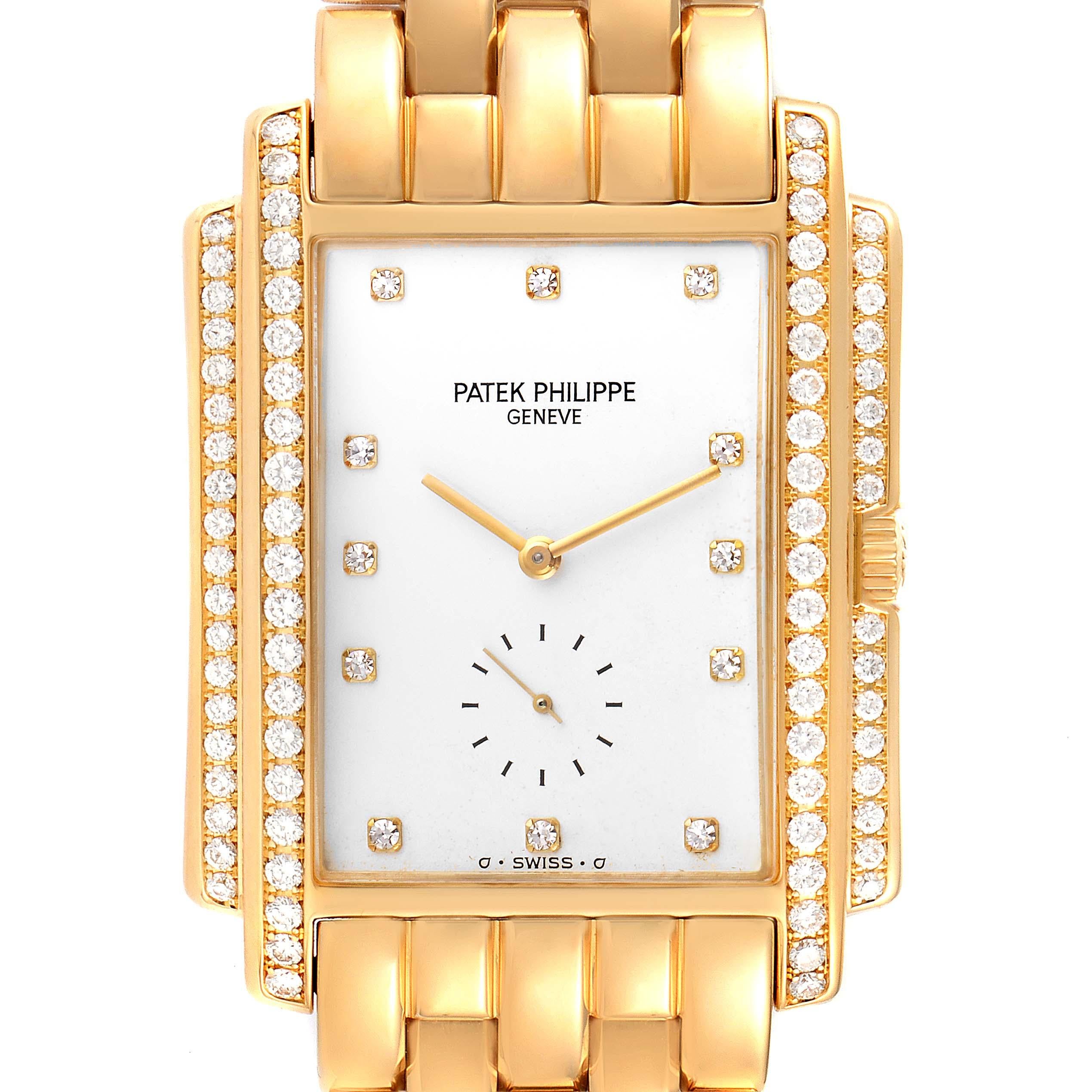 Patek Philippe Gondolo 18k Yellow Gold White Dial Diamond Mens Watch 5025. Manual winding movement. 18k yellow gold rectangular case 30.0 x 37.5 mm case. Diamond-set sides and lugs. 18K yellow gold stepped diamond bezel. Scratch resistant sapphire