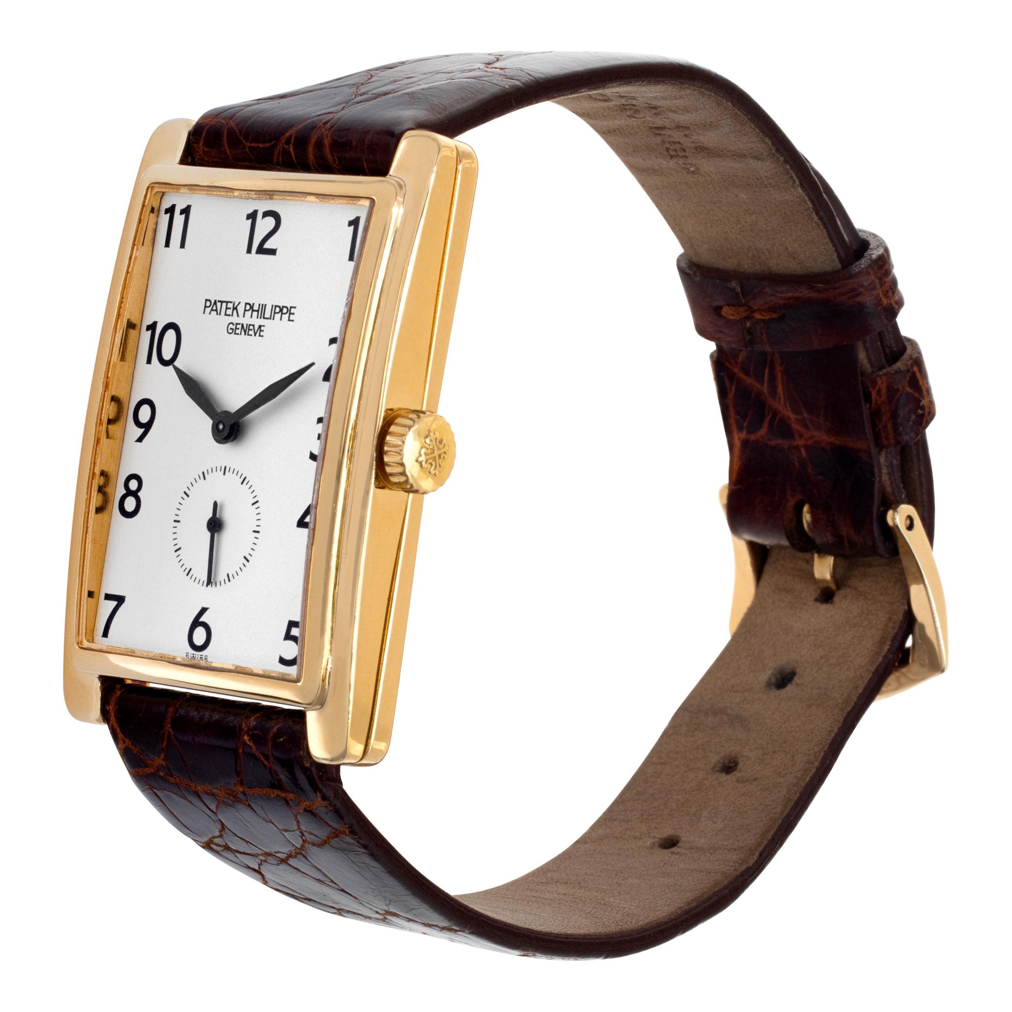 Patek Philippe Gondolo in 18k yellow gold on Italian made crocodile strap with PP 18k tang buckle. 215 Calibre. Manual w/ subseconds. 25 mm case size. Ref 5009. Fine Pre-owned Patek Philippe Watch.

 Certified preowned Vintage Patek Philippe Gondolo