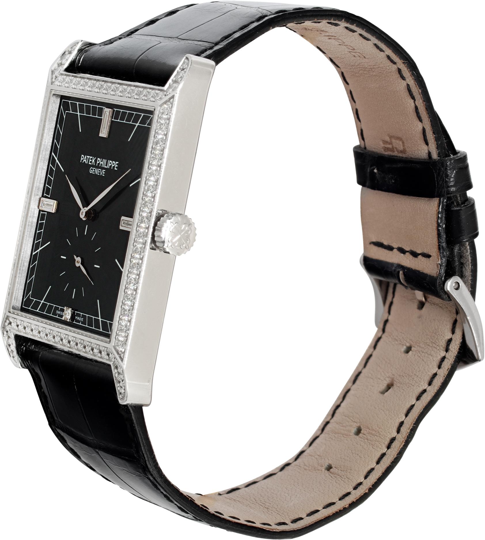 Patek Philippe Gondolo in 18k white gold with factory original diamond bezel & lugs set with 72 diamonds totalling approximately 1.22 carats and baguette diamond markers on dial at 12, 3, 6 & 9 o'clock. Manual w/ subseconds. 43 mm length (lug to
