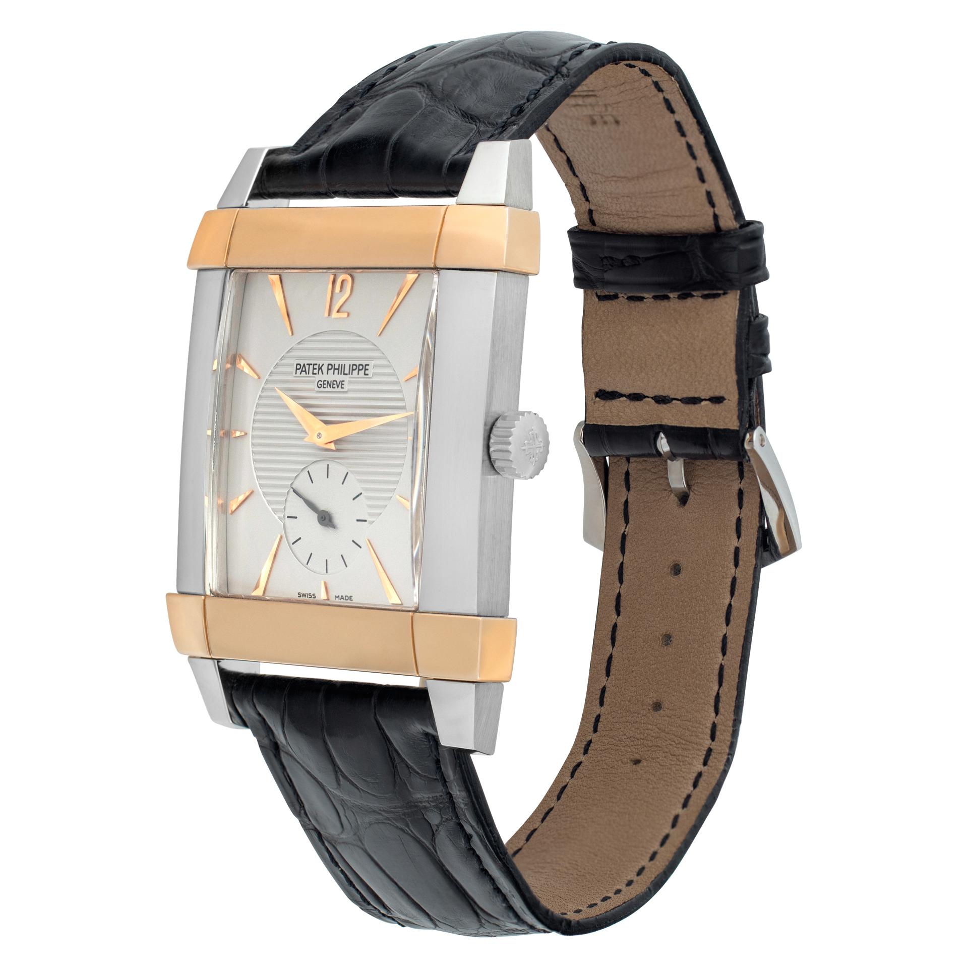 Mint, like new! Patek Philippe Gondolo in platinum & 18k rose gold on black alligator strap with PP platinum tang buckle. Manual w/ subseconds. 47mm length by 32 mm width case size. With original Patek plastic bag & tag. Ref 5111PR. Circa 2000s.