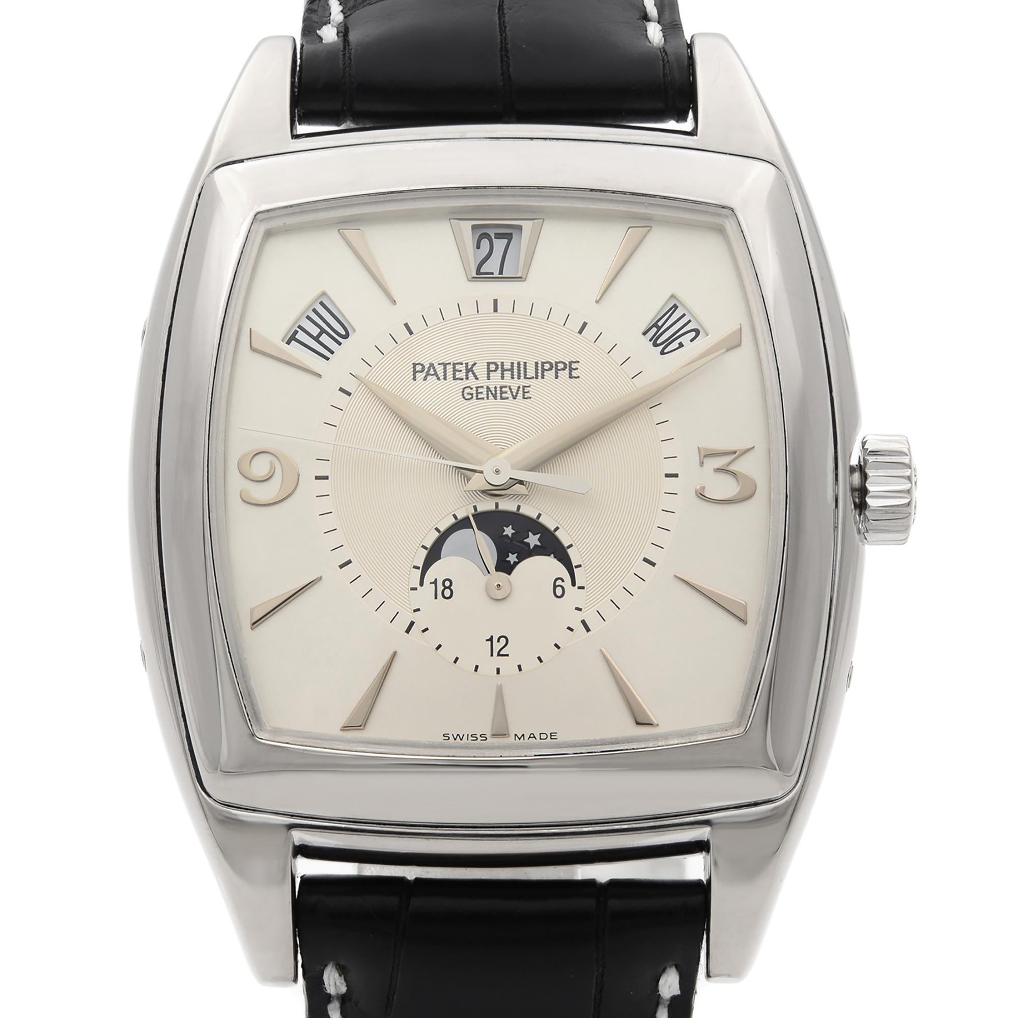 This pre-owned Patek Philippe Gondolo 5135 is a beautiful men's timepiece that is powered by mechanical (automatic) movement which is cased in a white gold case. It has a round shape face, annual calendar, day & date, moon phase dial and has hand