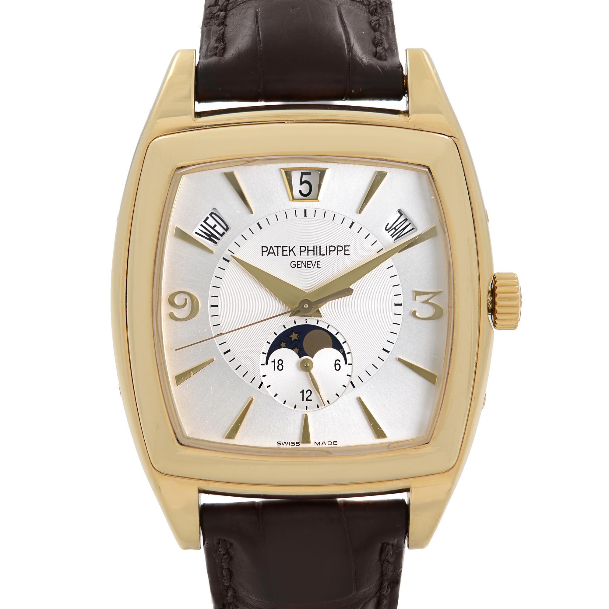 Pre-owned Patek Philippe Gondolo Annual Calendar 18K Yellow Gold Silver Dial Automatic Men's Watch 5135J-001. Minor Wear and Stains on the Leather Strap. Screeches on the Minutes Hands Under Closer Inspection. Small Blemishes on Our Markers. This