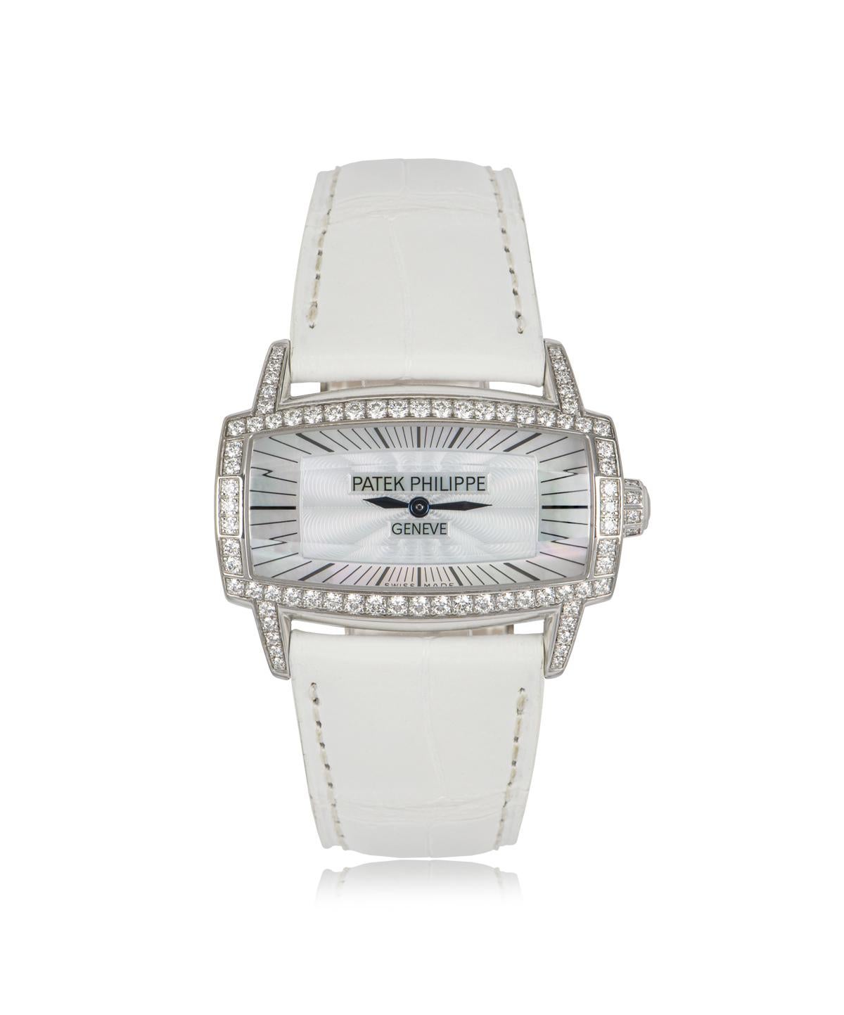 A quartz 37mm Gondolo  Gemma women's wristwatch, made from 18k white gold, by Patek Philippe.

The white mother of pearl dial is protected by a faceted sapphire crystal and surrounded by a fixed bezel and lugs, which are set with a total of