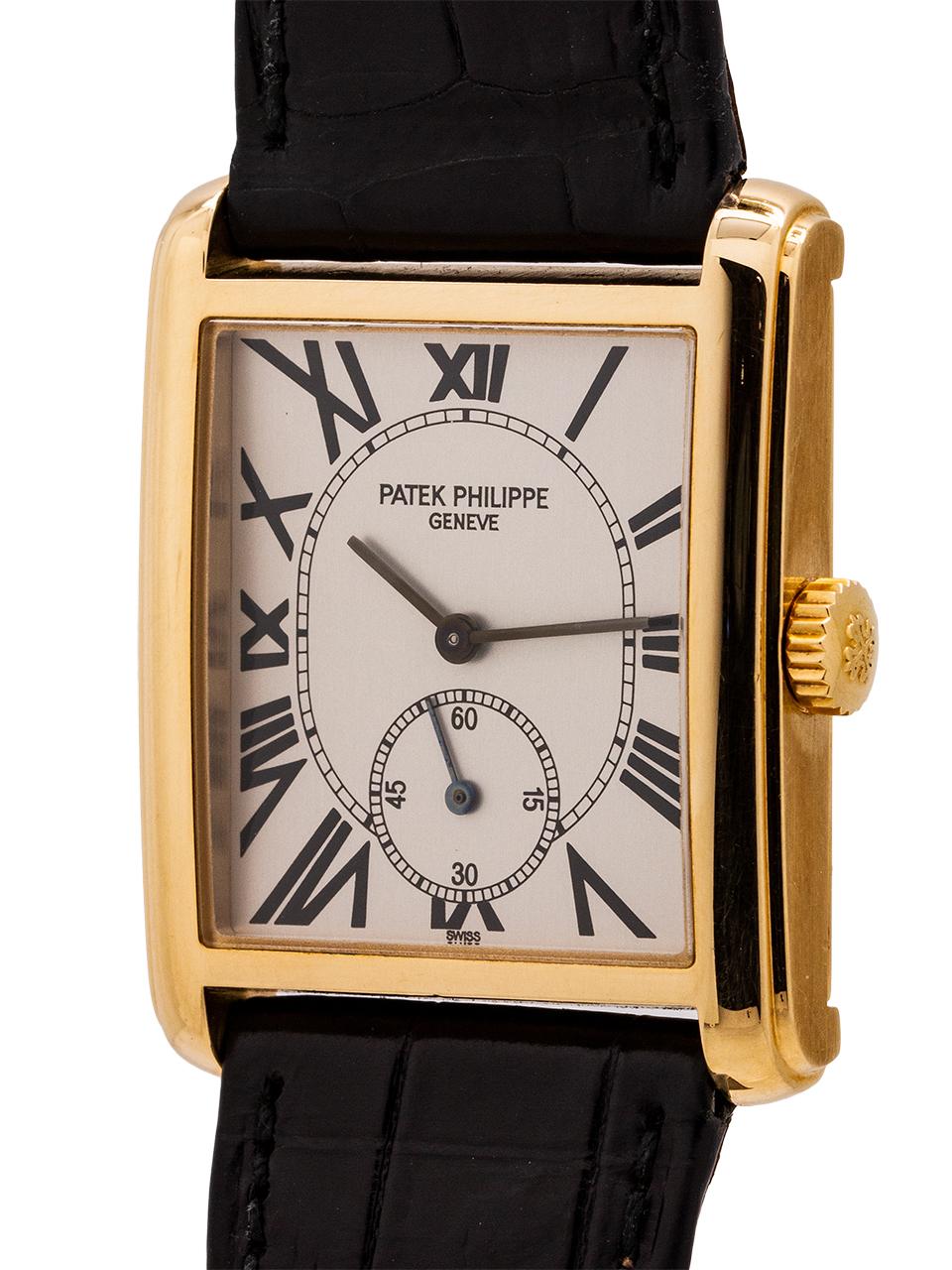 
Patek Philippe Gondolo ref. 5014 circa 1990’s. Featuring a 27 x 35mm yellow gold case with attractive stepped bezel and short lugs. Featuring an original matte silver dial with printed black Roman numerals and thin blued stick hands. Powered by the