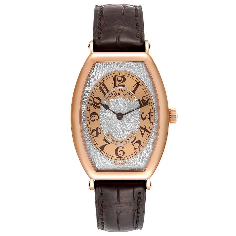 Patek Philippe Gondolo Rose Gold Brown Strap Mens Watch 5098 Papers. Manual winding movement. 18K rose gold tonneau case 42.0 x 32.0 mm. Exhibition sapphire case back. . Scratch resistant sapphire crystal. Silver and brown guilloche dial with Arabic