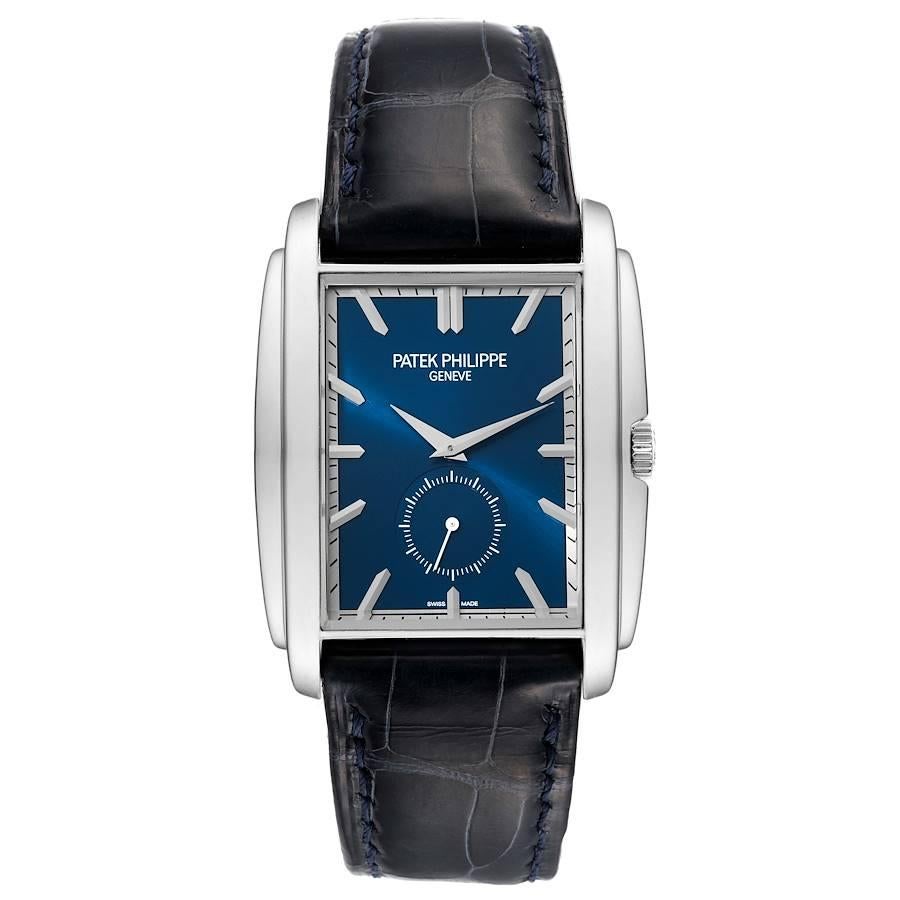 Patek Philippe Gondolo Small Seconds White Gold Blue Dial Mens Watch 5124. Manual winding movement. 18K white gold rectangular case 43 mm x 33.4 mm. . Scratch resistant sapphire crystal. Blue sunburst dial with raised baton hour markers. White gold