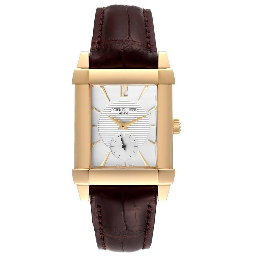 Patek Philippe Gondolo Small Seconds Yellow Gold Silver Dial Mens Watch 5111. Manual winding movement. 18K yellow gold rectangular case 47.5 mm x 35.5 mm. . Scratch resistant sapphire crystal. Silver dial with raised baton hour markers. Yellow gold