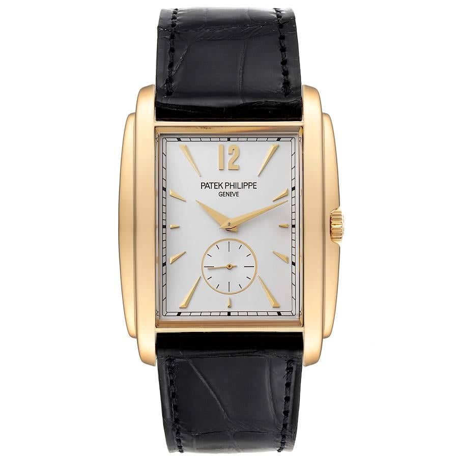 Patek Philippe Gondolo Small Seconds Yellow Gold Silver Dial Mens Watch 5124. Manual winding movement. 18K yellow gold rectangular case 43 mm x 33.4 mm. . Scratch resistant sapphire crystal. Silver sunburst dial with raised baton hour markers.