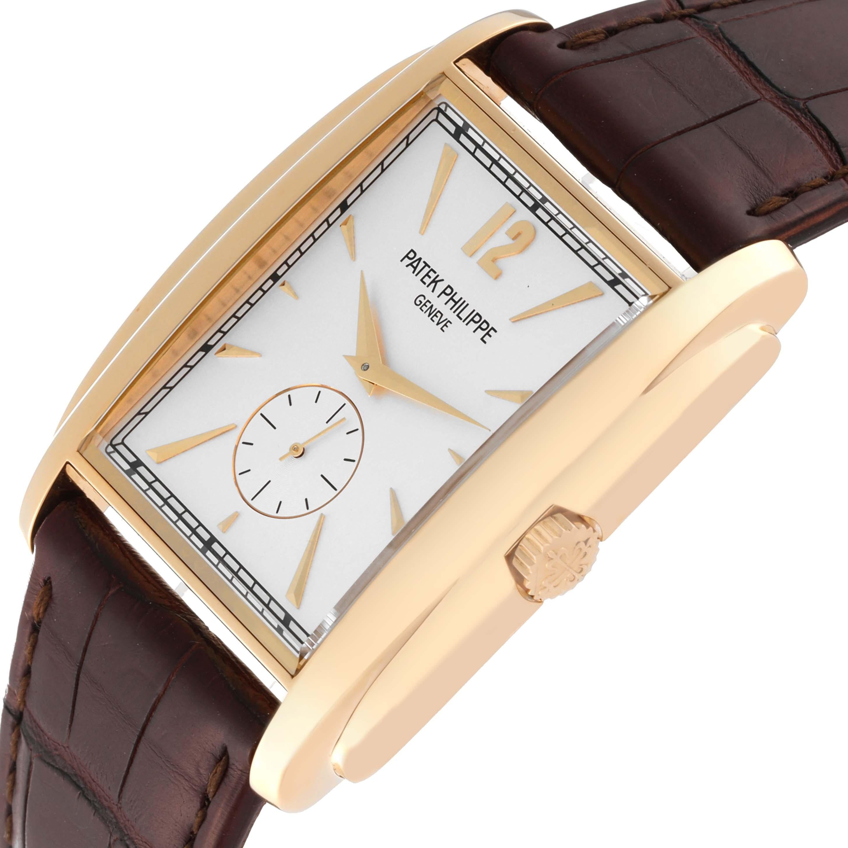 Patek Philippe Gondolo Small Seconds Yellow Gold Silver Dial Mens Watch 5124. Manual winding movement. 18K yellow gold rectangular case 43 mm x 33.4 mm. . Scratch resistant sapphire crystal. Silver dial with raised yellow gold baton hour markers and
