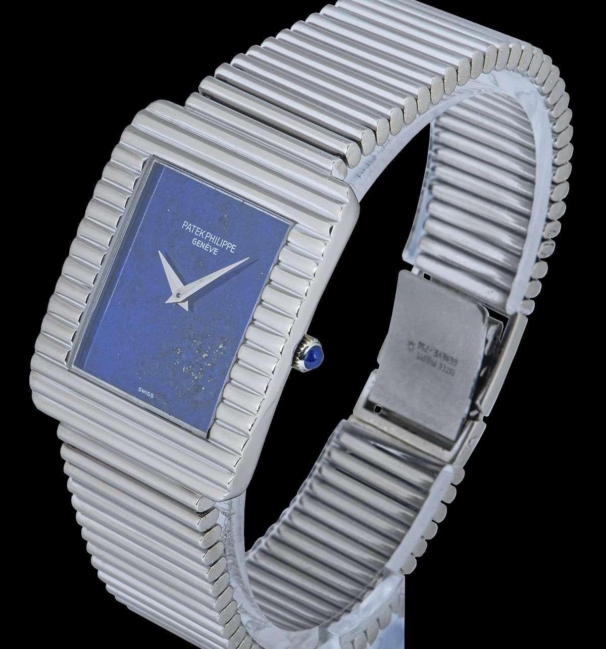 A 29 mm 18k White Gold Rare Gondolo Vintage Gents Dress Wristwatch, rare lapis lazuli dial, an 18k white gold ribbed case, an original 18k white gold ribbed bracelet with an 18k white gold jewellery style clasp, sapphire glass, manual wind movement,