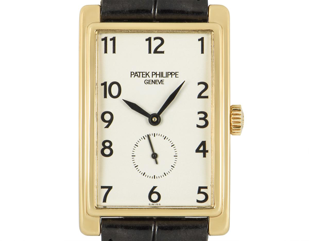 A 25.5 mm yellow gold Gondolo by Patek Philippe, with a silver dial featuring a small seconds display. The black leather strap has an original yellow gold pin buckle. Fitted with sapphire glass and a manual wind movement.

The piece is in fine