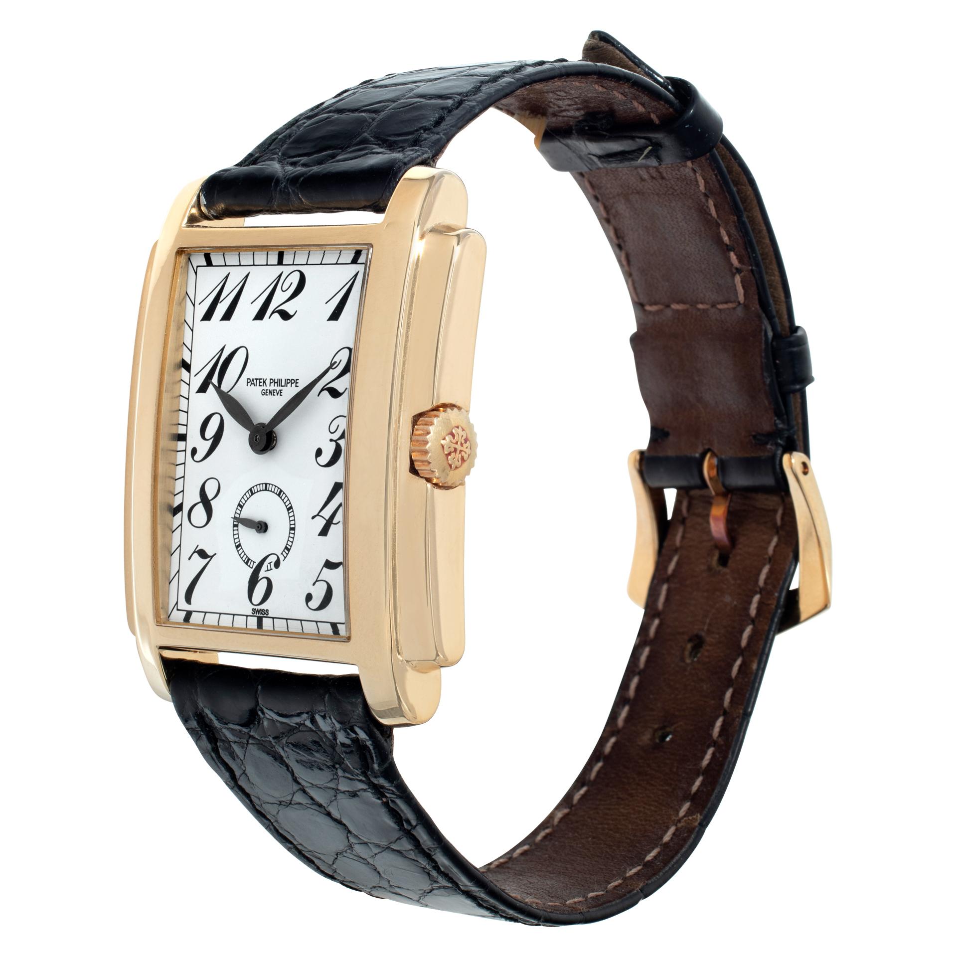 Patek Philippe Gondolo in 18k on black crocodile strap with 18k PP tang buckle. Manual wind with sub-subseconds. Measures 38mm long (lug to lug) by 30mm wide. With original Patek Philippe papers. Ref 5024. Fine Pre-owned Patek Philippe Watch.

