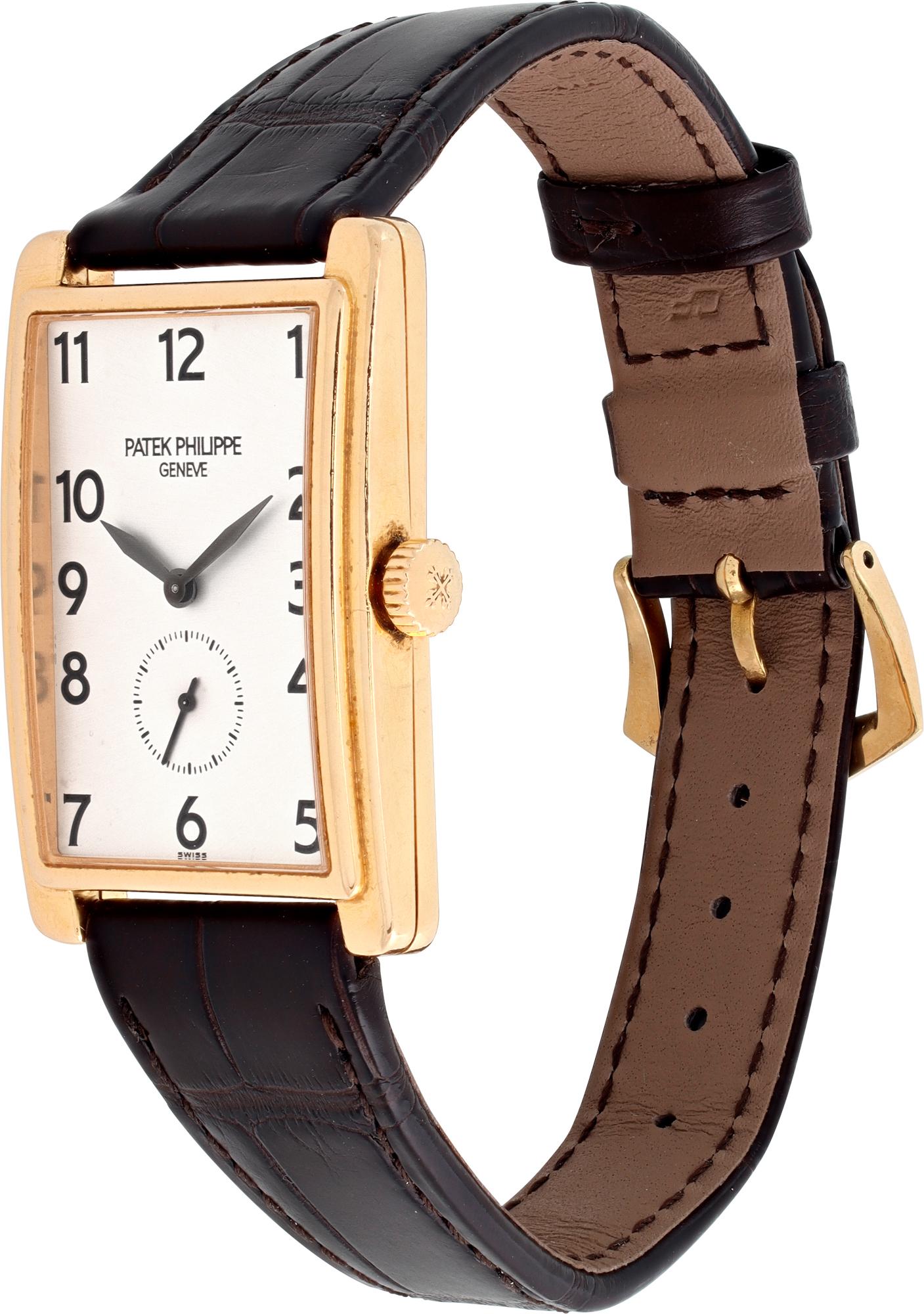 Patek Philippe Gondolo in 18k yellow gold on dark brown alligator strap with 18k PP tang buckle. Manual w/ subseconds. 25.5 mm case size. With box. Ref 5009. Fine Pre-owned Patek Philippe Watch.

 Certified preowned Dress Patek Philippe Gondolo 5009