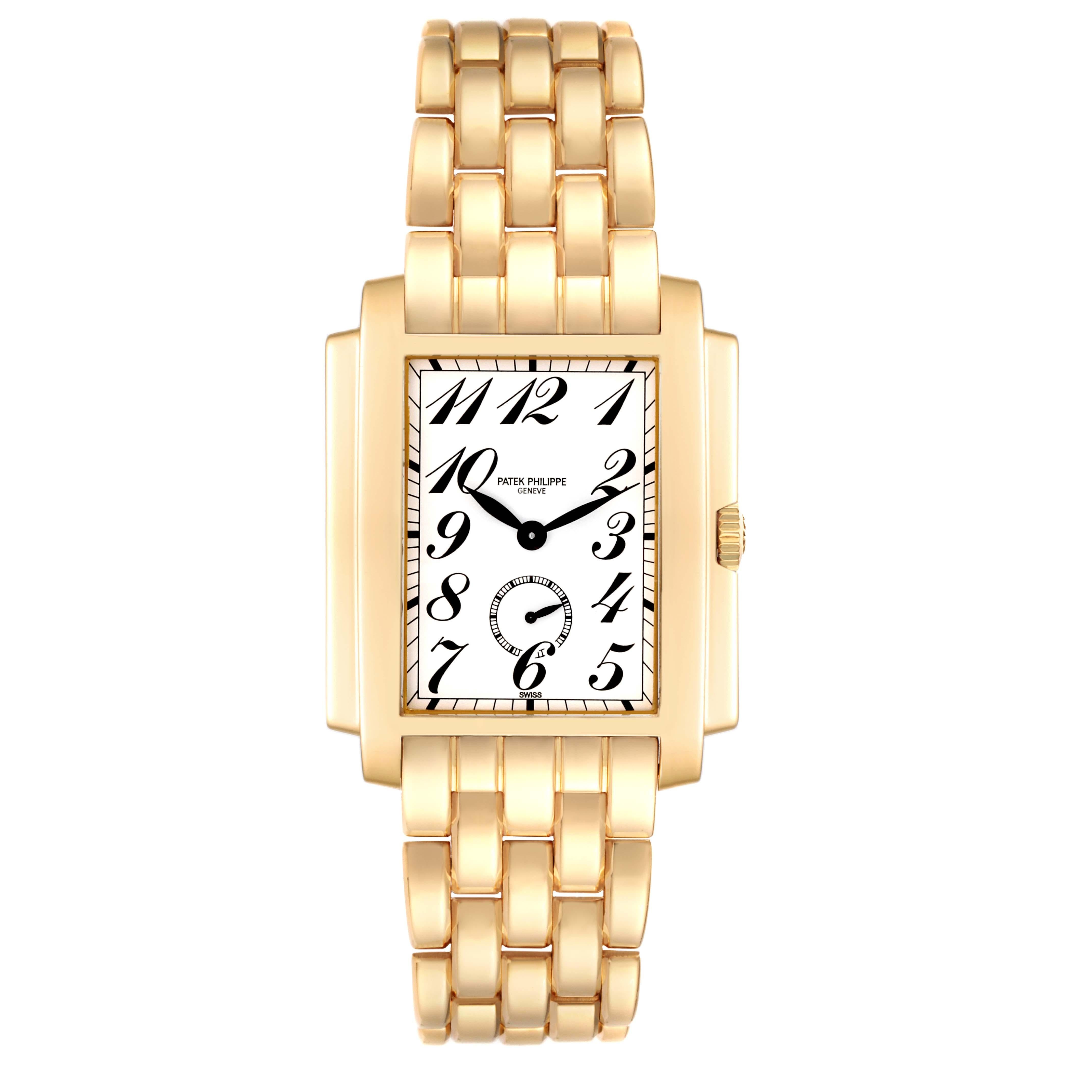 Patek Philippe Gondolo Yellow Gold Small Seconds Mens Watch 5024 Box Papers. Manual winding movement. 18K yellow gold rectangular case 30mm x 38mm mm. . Scratch resistant sapphire crystal. Silver dial with black Arabic numerals. Small seconds