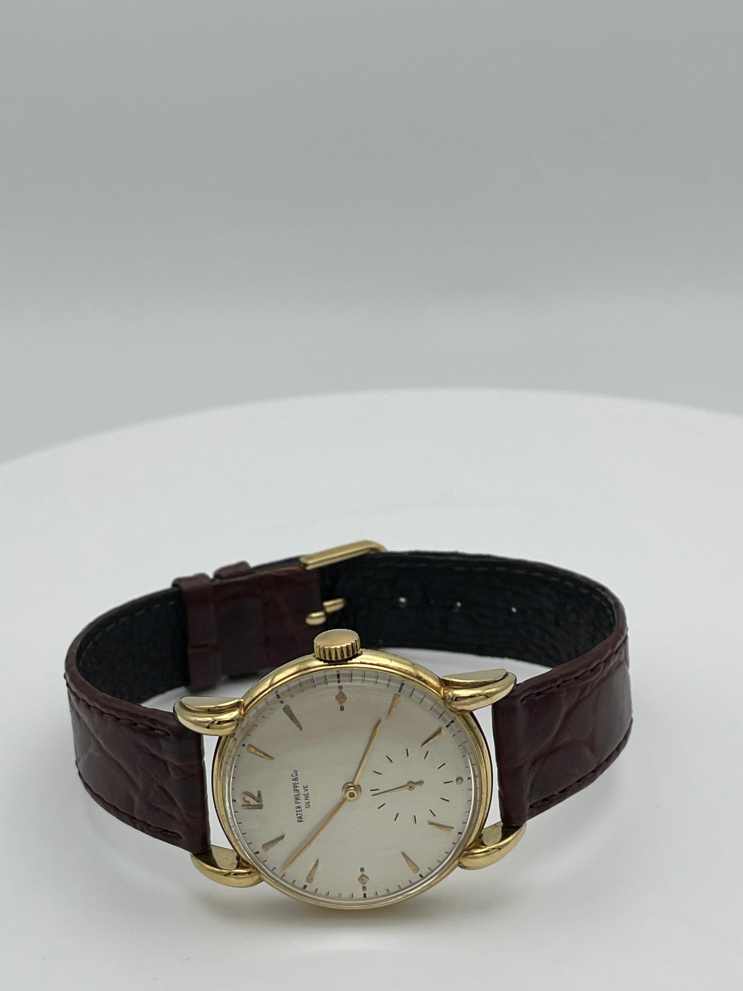 Vintage Patek Philippe Handwriting Watch Ref. 1590
Ser# 655670
Watchcase: 35mm
Brown Patek krokoleather watch strap 
Fully serviced by a professional watchmaker with 53 years of experience 
18k Yellow Gold .750 
Silver beige dial
 8 1/4 in.
Perfect