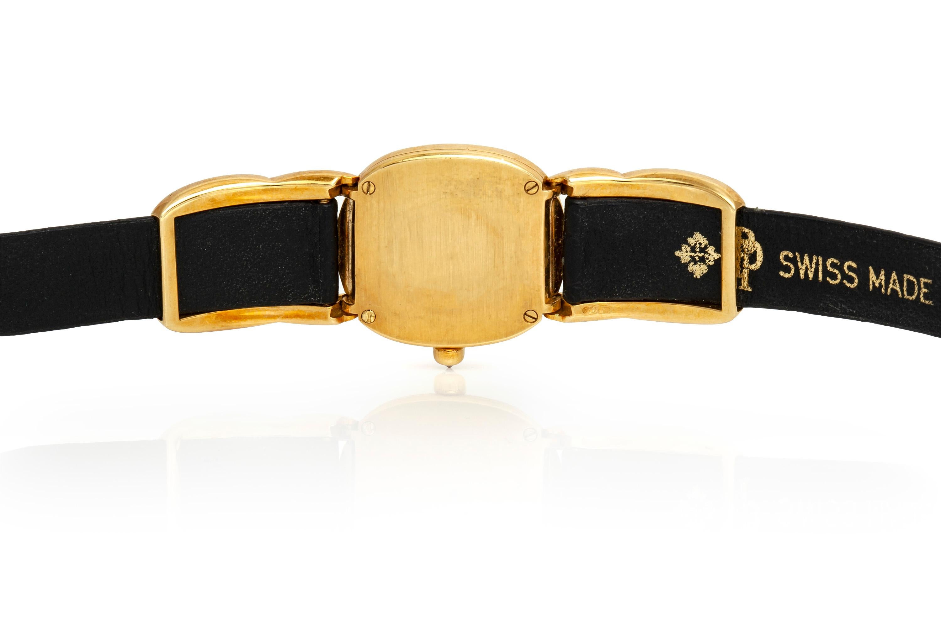 Patek Philippe watch, finely crafted in 18k yellow gold with diamonds and original strap.