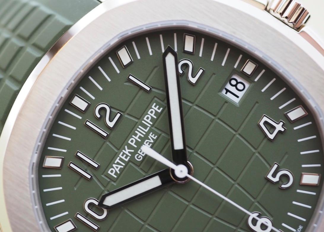 Patek Philippe Aquanaut Jumbo in 18k white gold case and 18k white gold satin bezel, sapphire crystal with a tropical kaki green rubber strap. 
Green dial with silver-tone hands and Arabic numeral hour markers and automatic mechanical