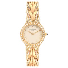 Patek Philippe Montre La Flamme en or jaune 18 carats et diamants, pour femmes 4816