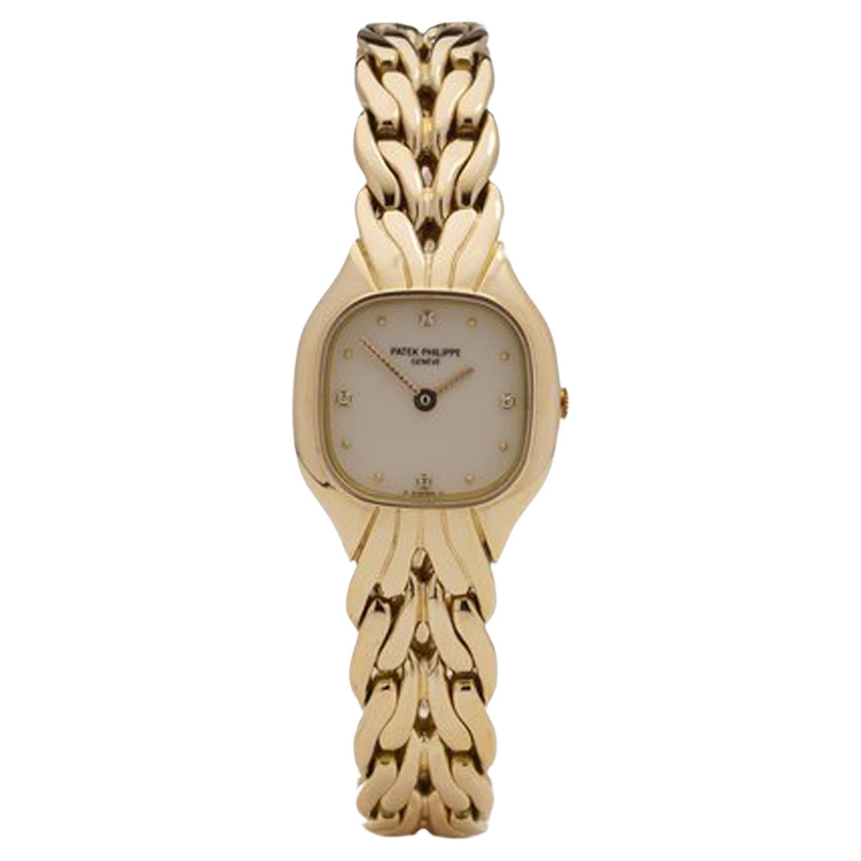 Patek Philippe La Flamme 18kt yellow gold lady's Quartz bracelet wristwatch