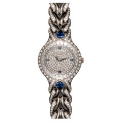Patek Philippe La Flamme 4818/11G-001 Pave Diamond and Sapphire Dial Diamond Bez