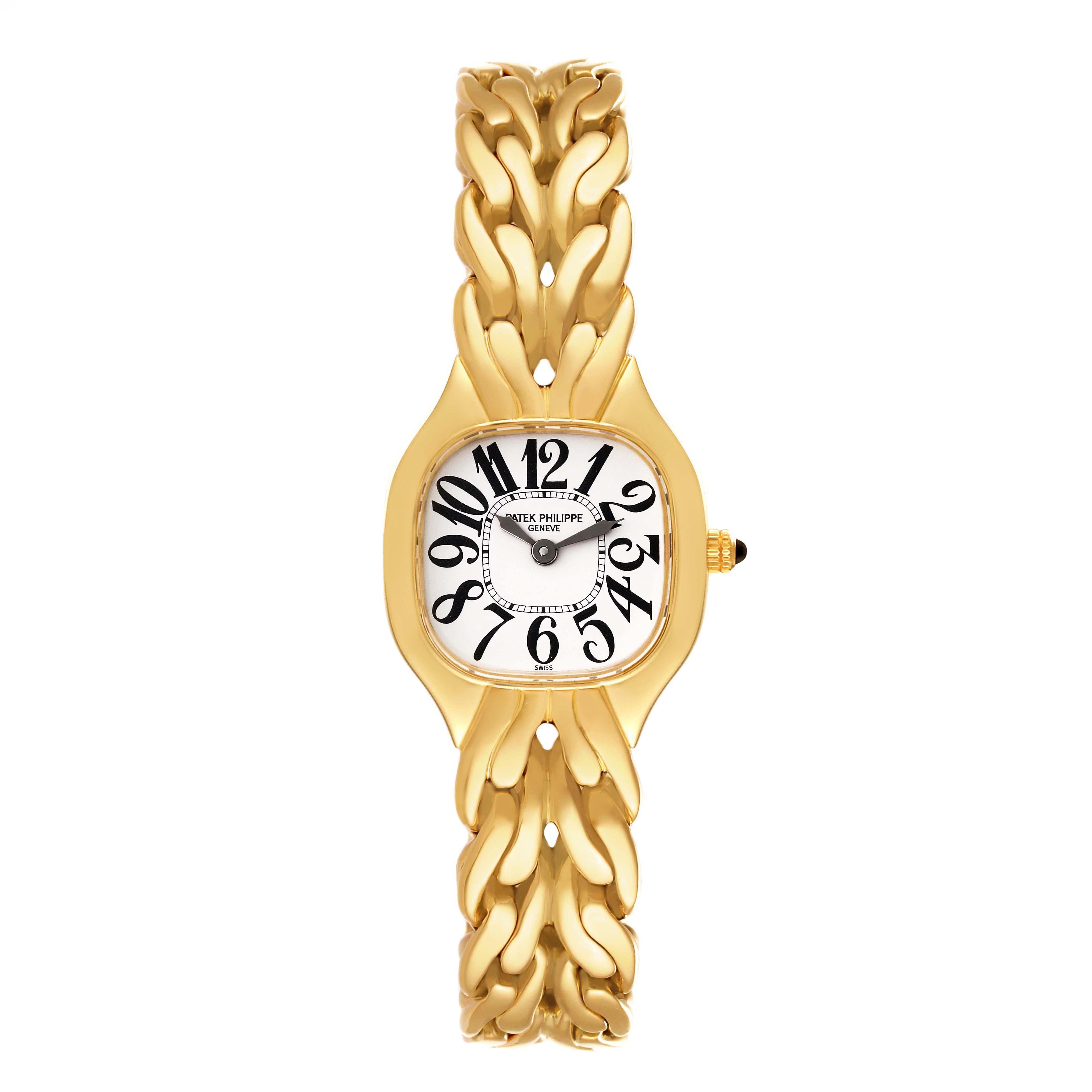 Patek Philippe La Flamme Yellow Gold Ladies Watch 4815. Quartz movement. 18k yellow gold cushion shape case 21 x 23 mm case. 18K yellow gold bezel. Scratch resistant sapphire crystal. White dial with black Arabic numeral hour markers and yellow gold