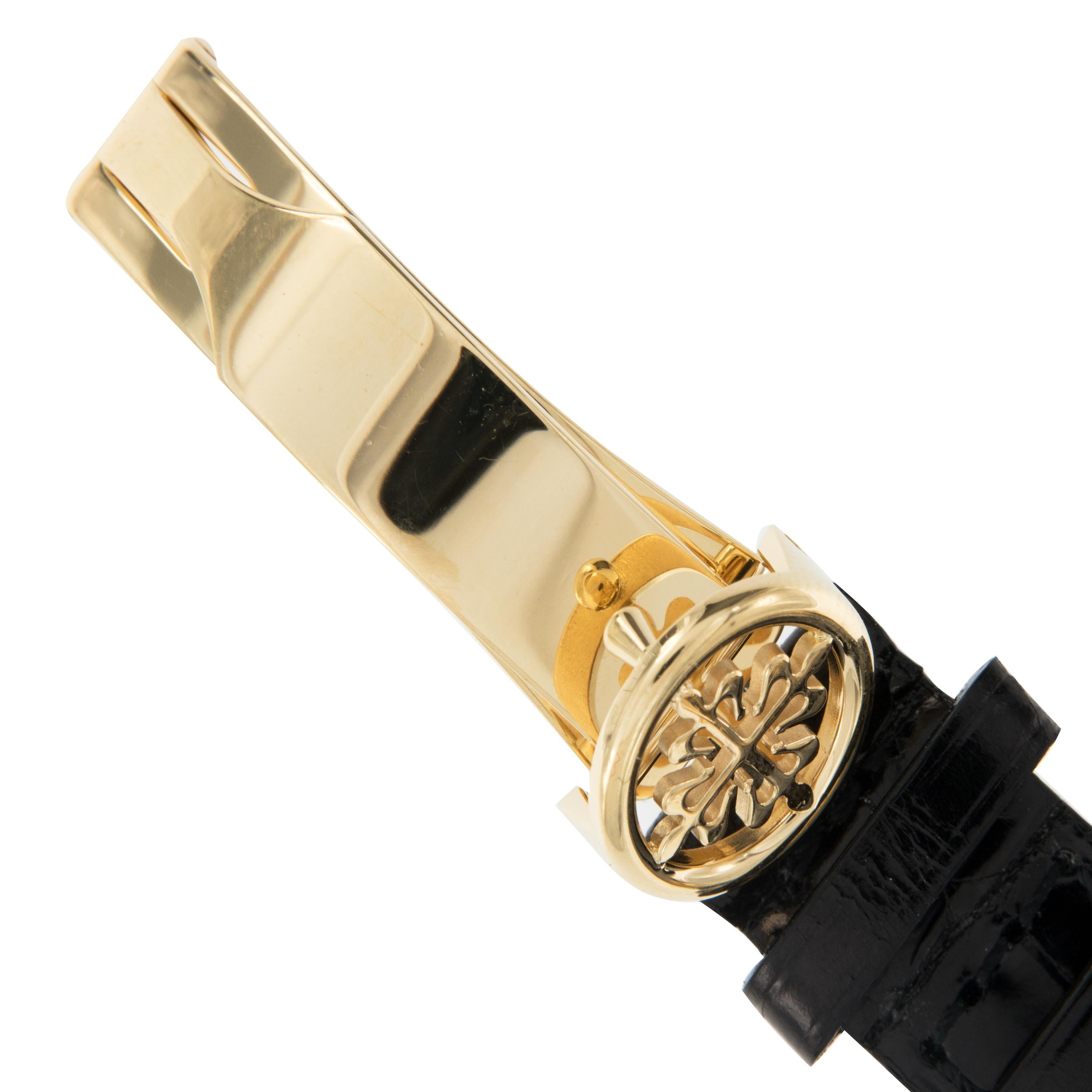 Patek Philippe Lady's 18 Karat Yellow Gold Calatrava Quartz Wristwatch Ref 4906J In Excellent Condition In Troy, MI