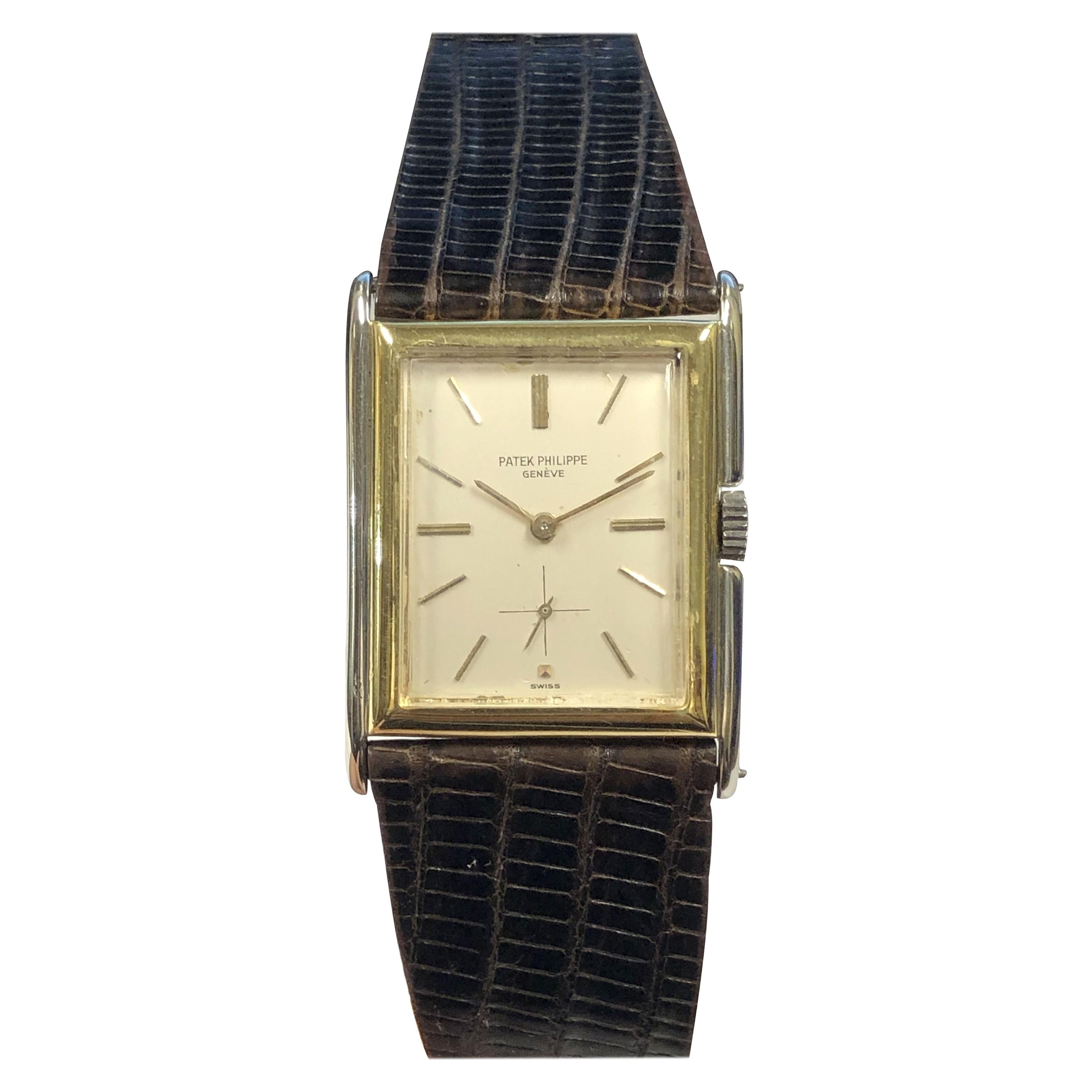Patek Philippe Große Armbanduhr mit gestuftem Gehäuse aus Weiß- und Gelbgold aus den 1920er Jahren