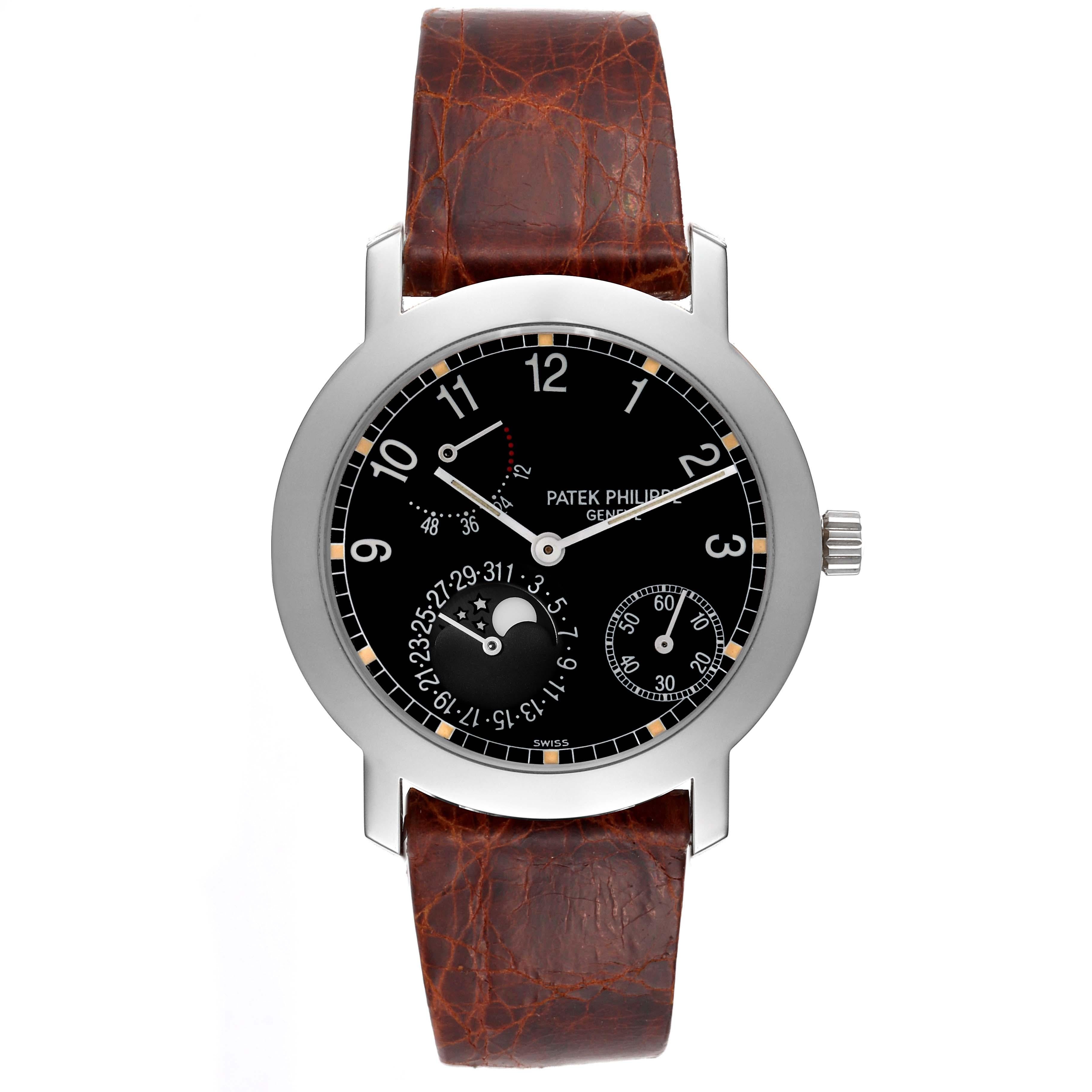 Patek Philippe Moonphase Power Reserve Weißgold Herrenuhr 5055 Box Papiere. Automatisches Uhrwerk mit Selbstaufzug. Selbstkompensierende Unruhspirale, massiver Goldrotor, 48 Stunden Gangreserve und mit dem Genfer Siegel graviert. Rundes Gehäuse aus