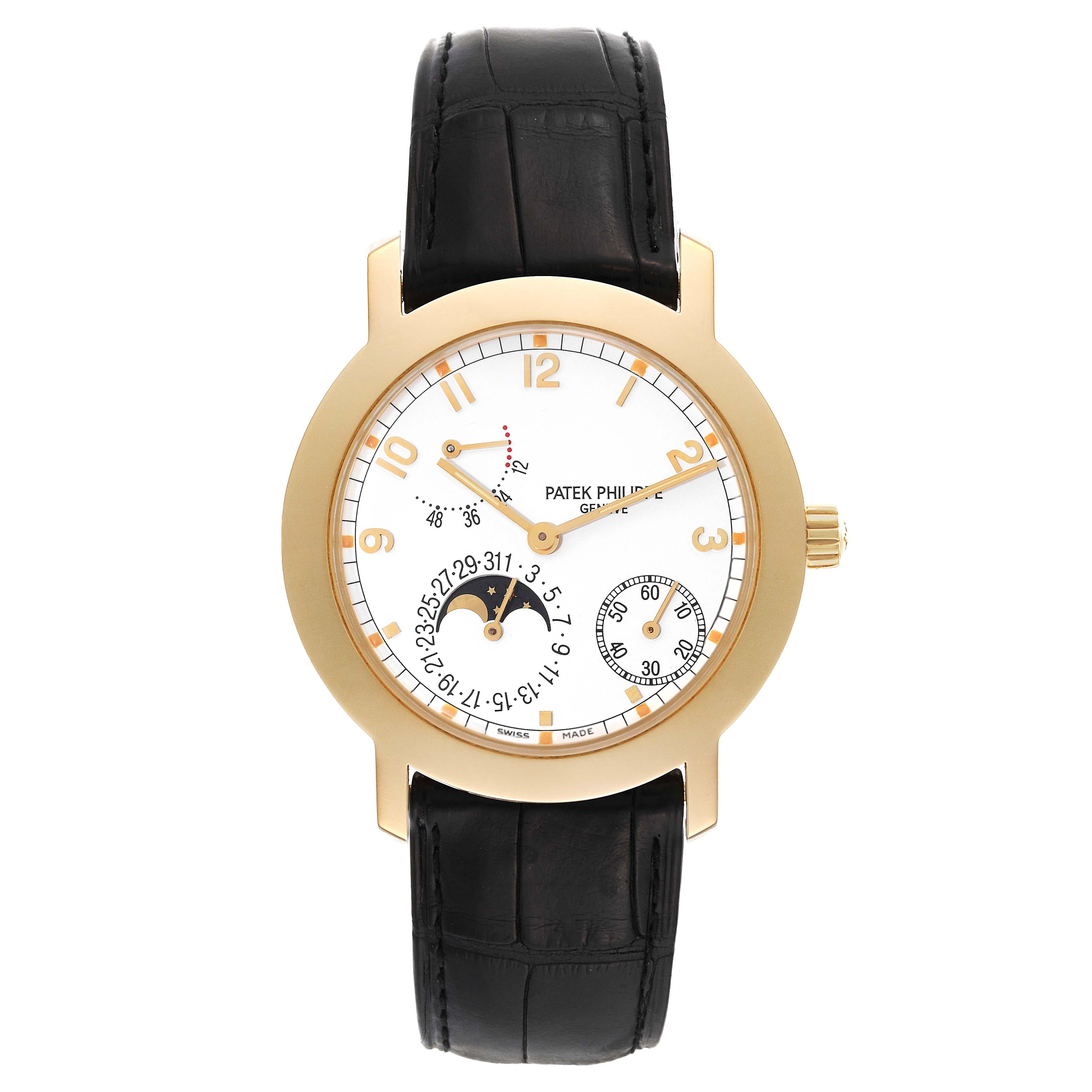 Patek Philippe Moonphase Power Reserve Yellow Gold Mens Watch 5055 Box Papers. Automatic self-winding movement. Self-compensating balance spring, solid gold rotor, 48 hour power reserve and engraved with the Geneva Seal. 18K yellow gold round case