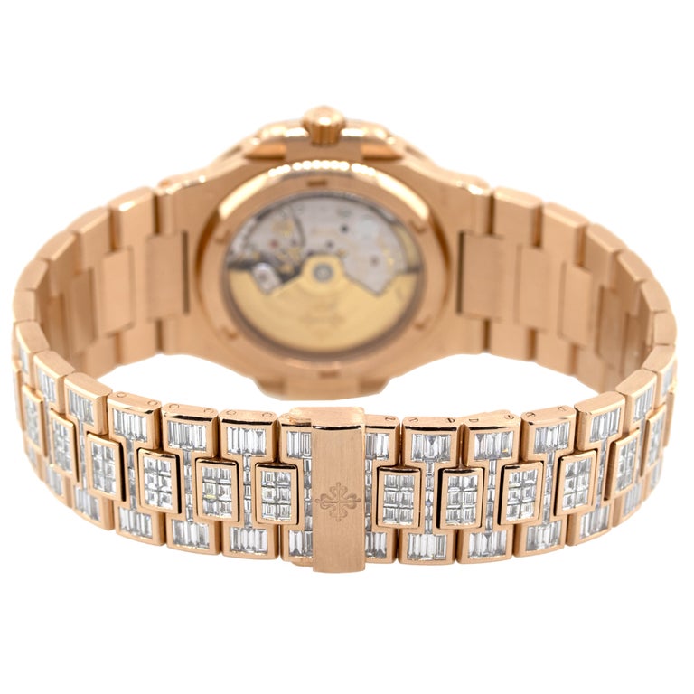Baguette Cut Patek Philippe Nautilus 18 Karat Rose Gold 70 Carat Baguette Diamond Wristwatch For Sale