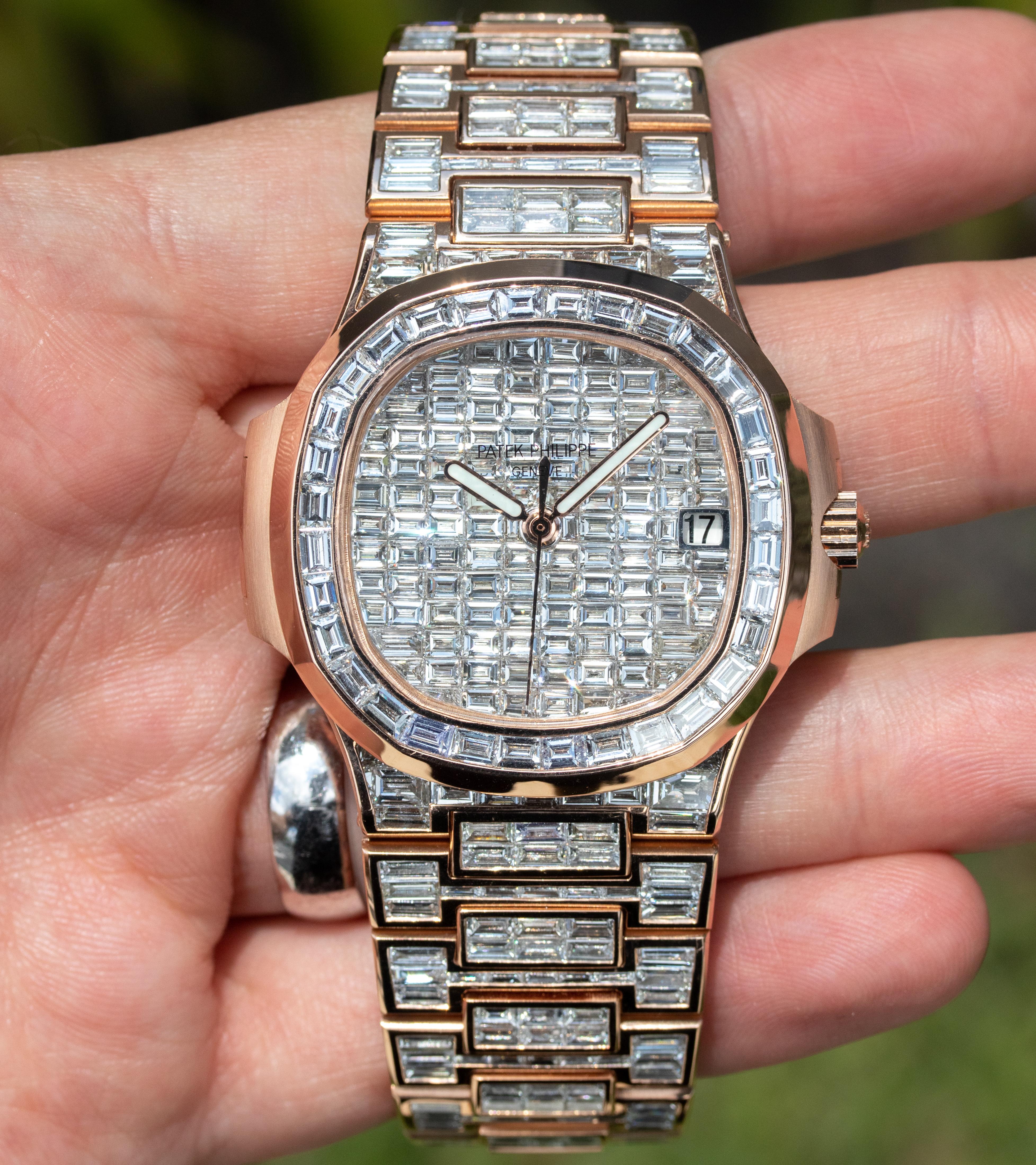 patek philippe yellow gold nautilus with baguette diamond bezel
